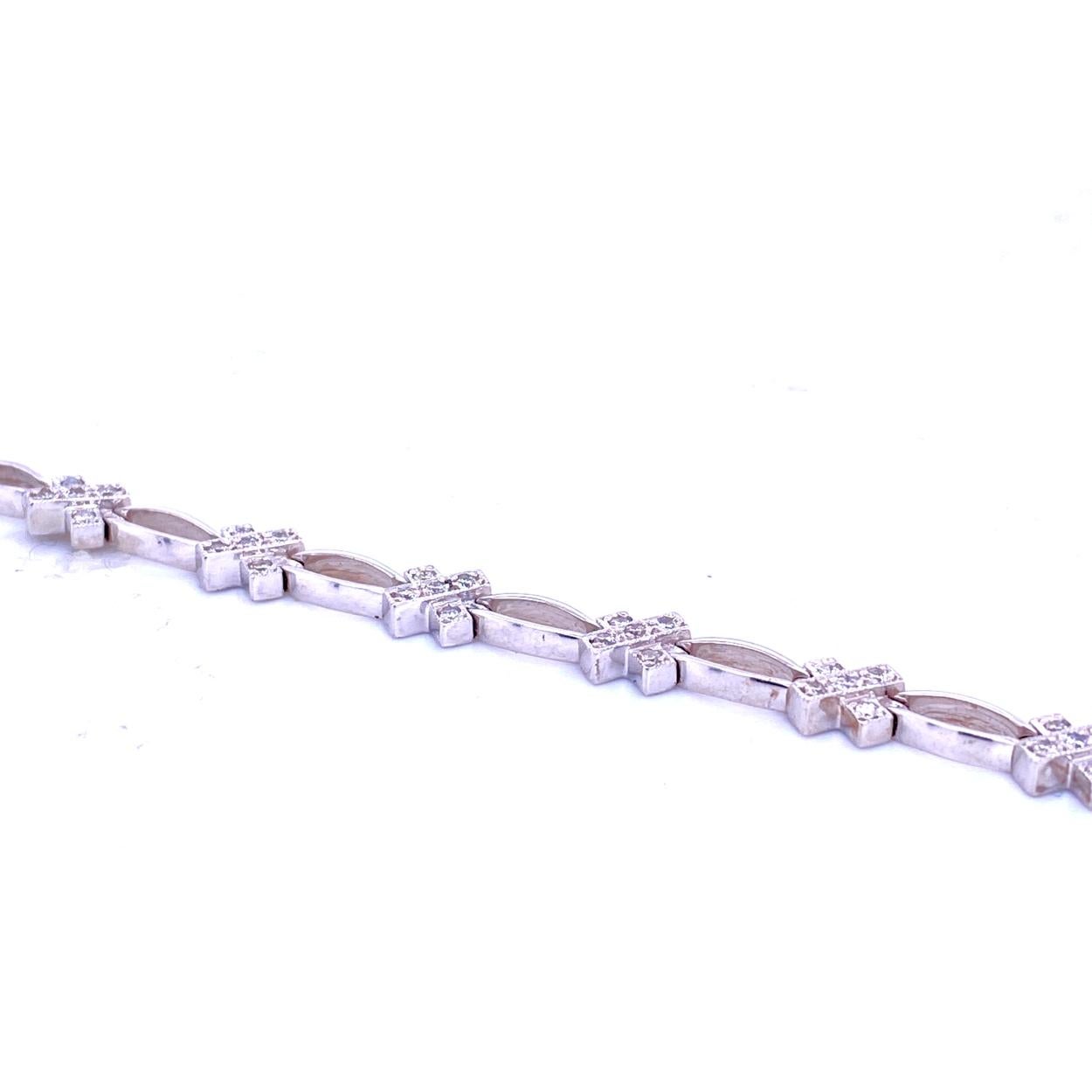 This Diamond Bracelet consists of 14 Links Pave Set with 70 1.2 mm Round Brilliant diamonds. The bracelet is made in 14K Gold .  The bracelet comes with a built in lock for safety.
Metal: 14K White Gold
Total Weight of diamonds: 0.63 Ct 
Total