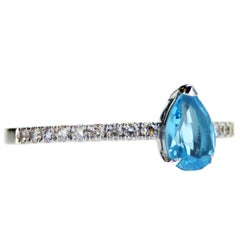 0.63Ct Natural Pear Shape Blue Topaz and diamonds ring
