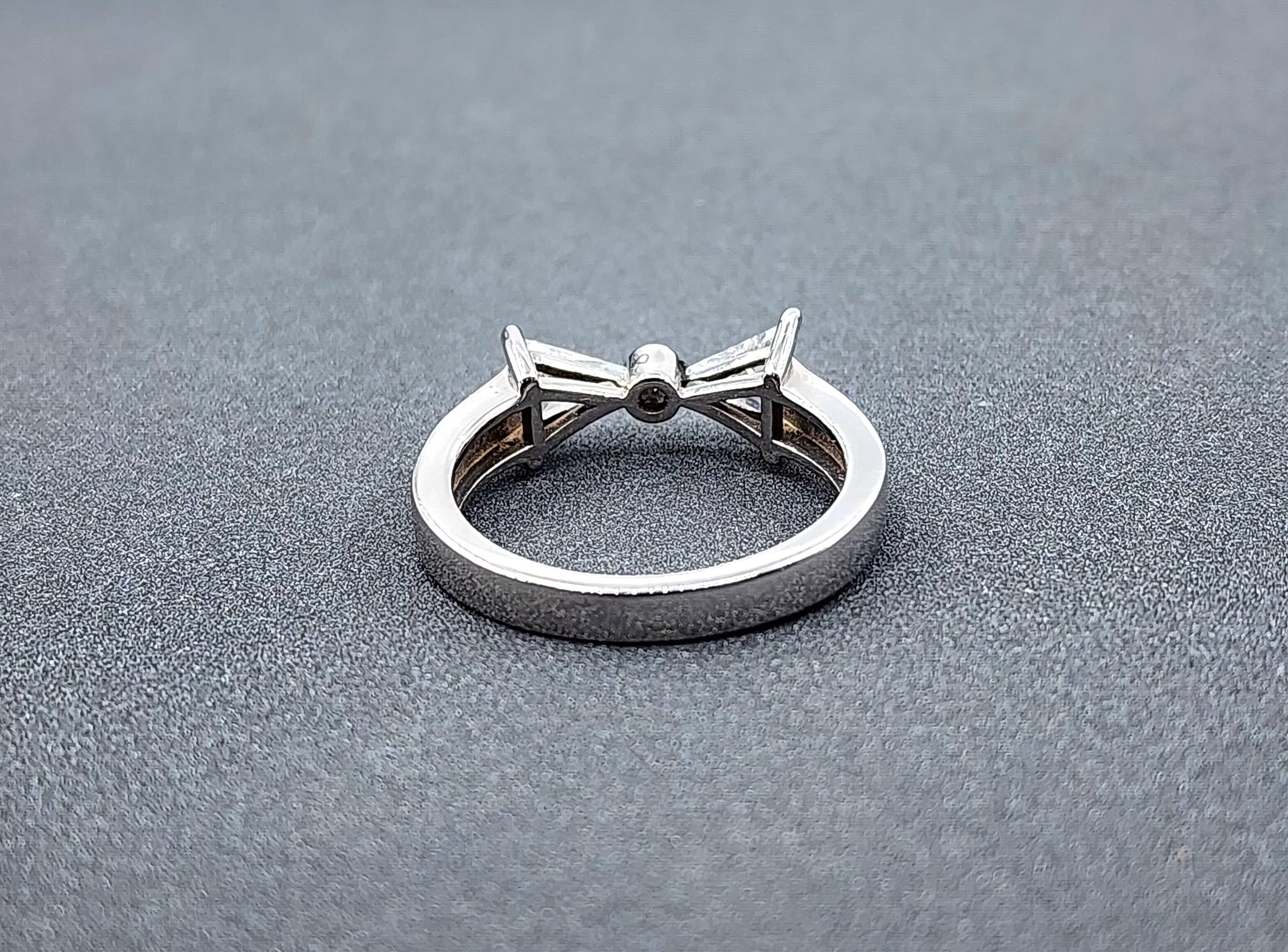 Modern 0.64 Bow Tie Diamond Ring For Sale