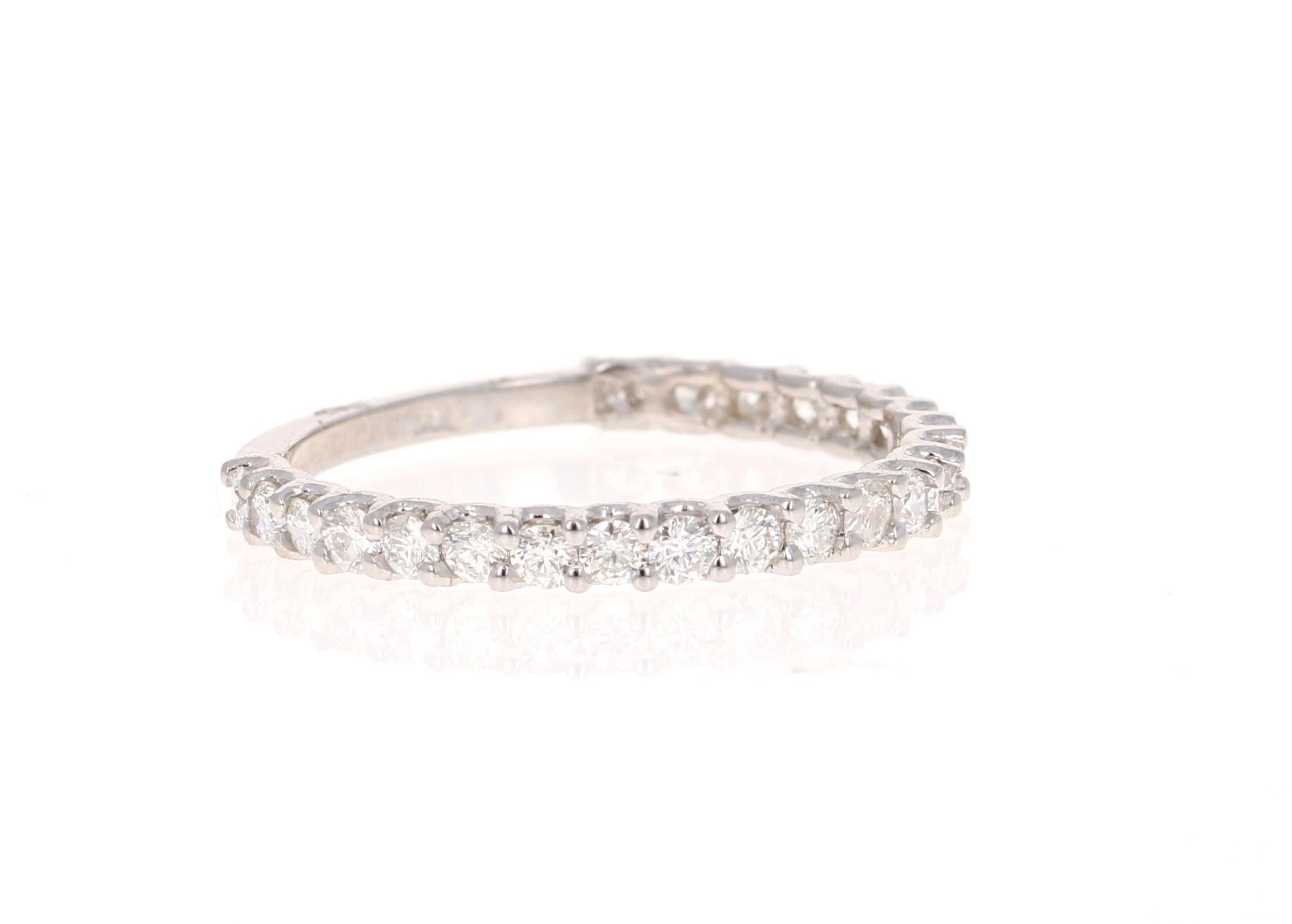 Cute and dainty 0.64 Carat Diamond band that is sure to be a great addition to anyone's accessory collection.   There are 23 Round Cut Diamonds that weigh 0.64 carats. The band is made in 14K White Gold and weighs approximately 1.4 grams.
These