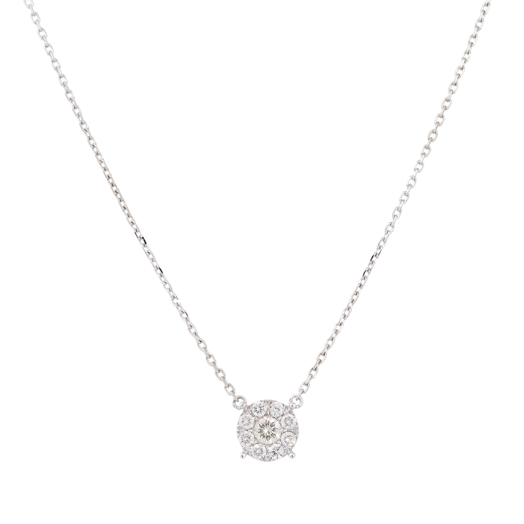 18k White Gold 0.64ctw Diamond Cluster Necklace

Material: 18k White Gold
Diamond Details: Approximately 0.64ctw of Round Cut Diamonds
Total Weight: 3.5g (2.3dwt)
Additional Details: This item comes with a presentation box!
SKU: G12911