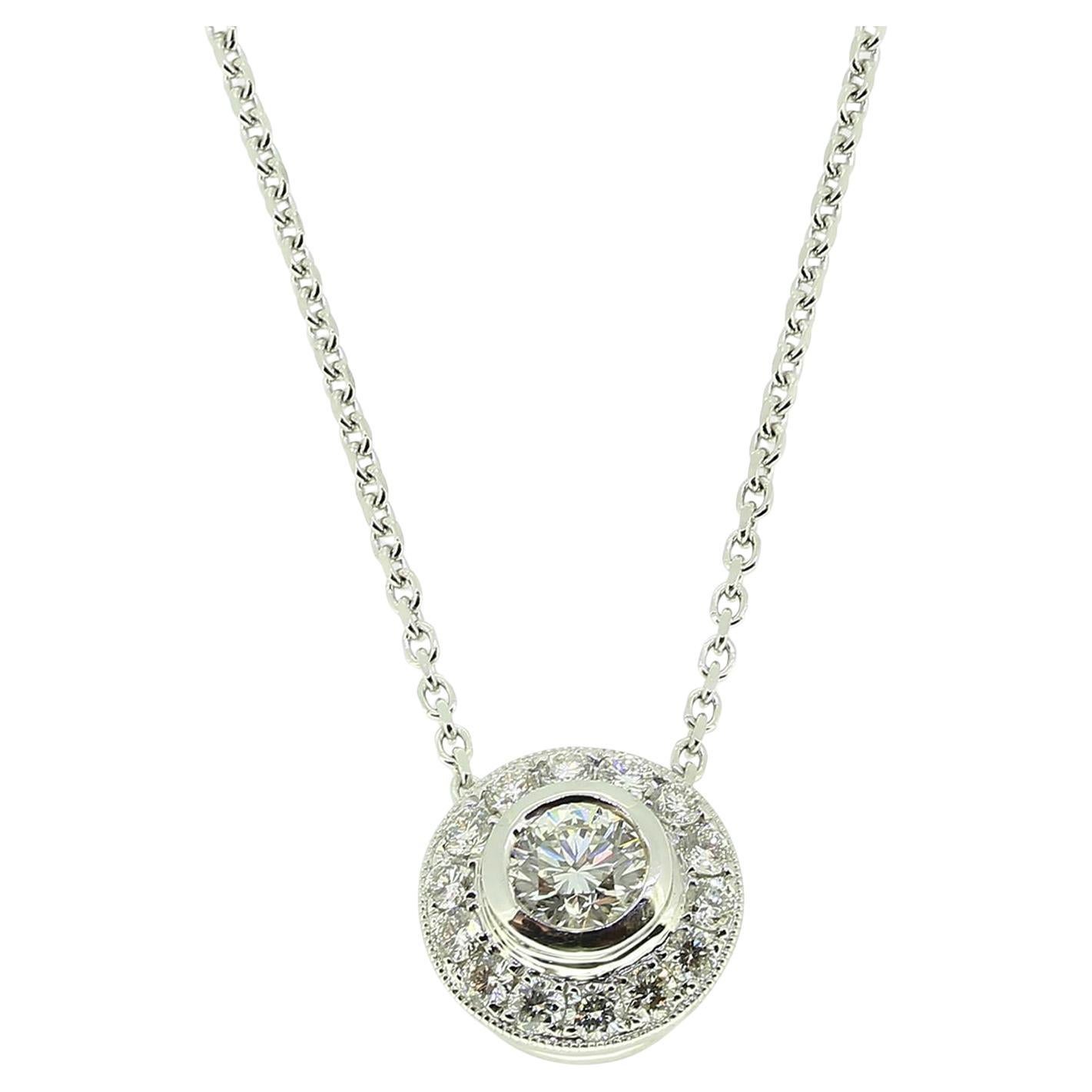 0.64 Carat Diamond Halo Pendant Necklace For Sale