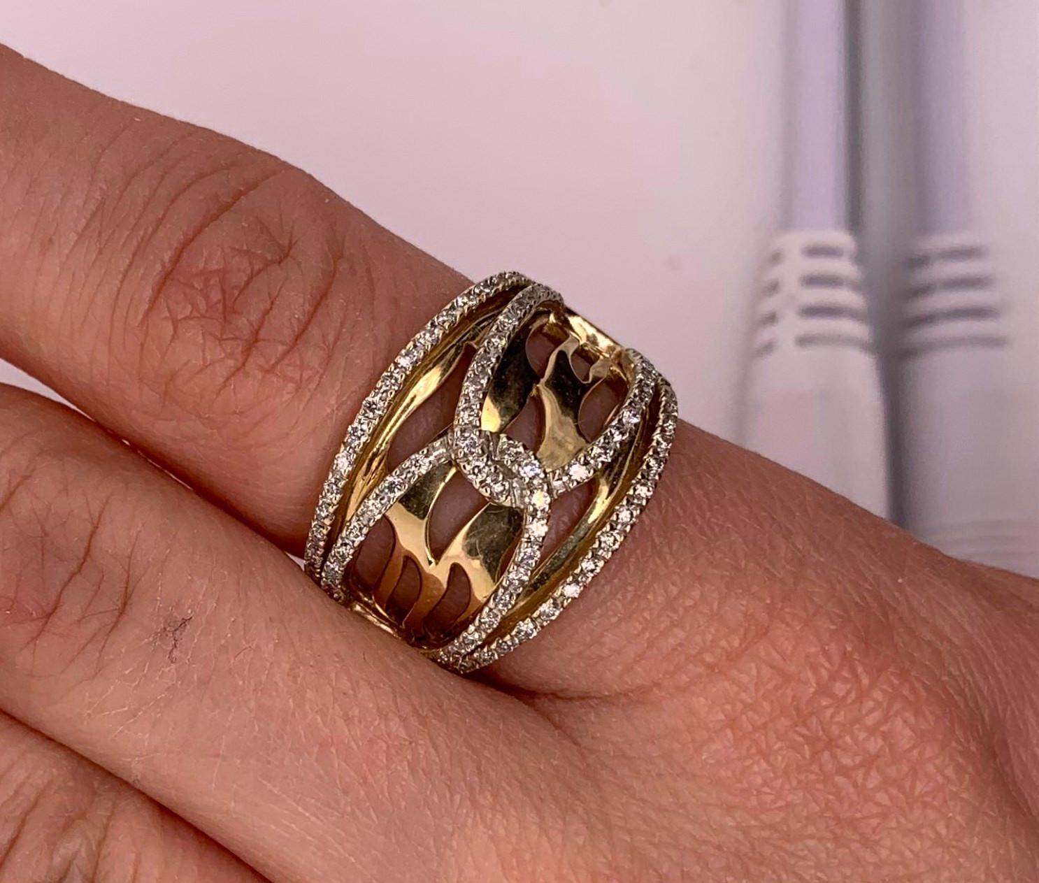 Material: 14k Yellow Gold 
Diamonds: Round White Diamonds at 0.64 Carats.  SI Clarity / H-I Color. 
Ring Size: 6.75. Alberto offers complimentary sizing on all rings.
This piece measures approximately 15.8 millimeters.
Fine one-of-a-kind