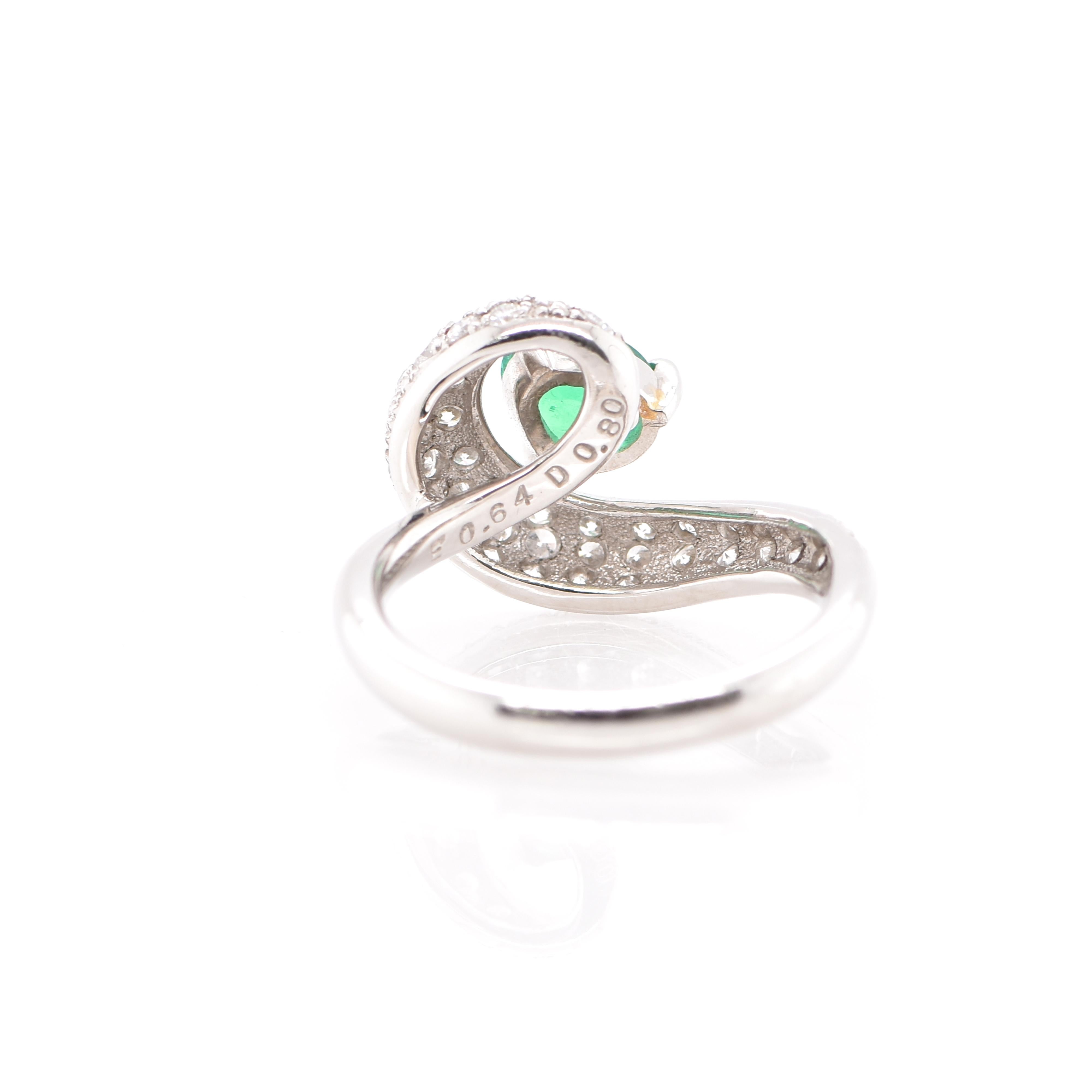 Women's 0.64 Carat Natural Emerald and Diamond Ring Set in Platinum