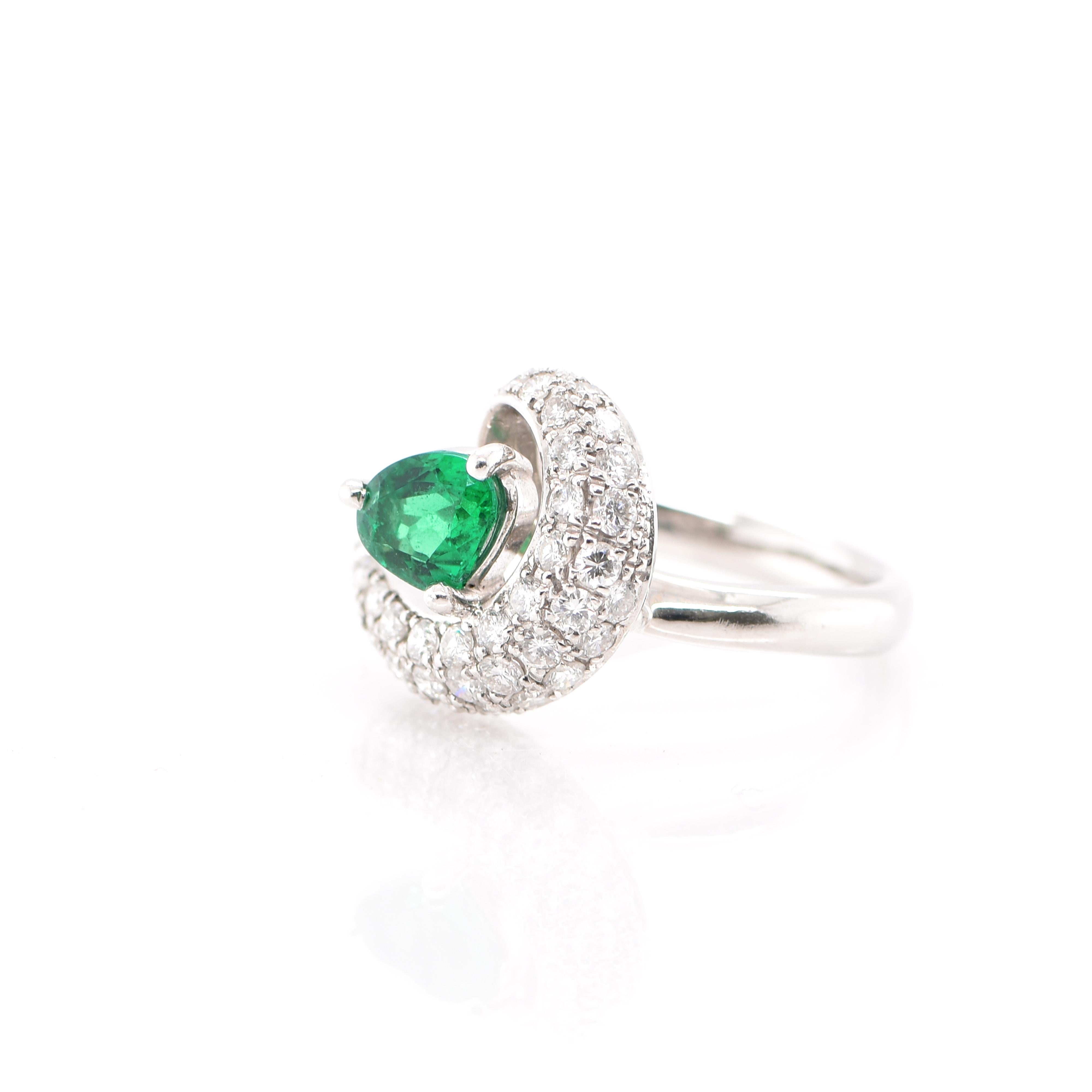A stunning fashion ring featuring a 0.64 Carat Emerald and 0.80 Carats of Diamond Accents set in Platinum. People have admired emerald’s green for thousands of years. Emeralds have always been associated with the lushest landscapes and the richest