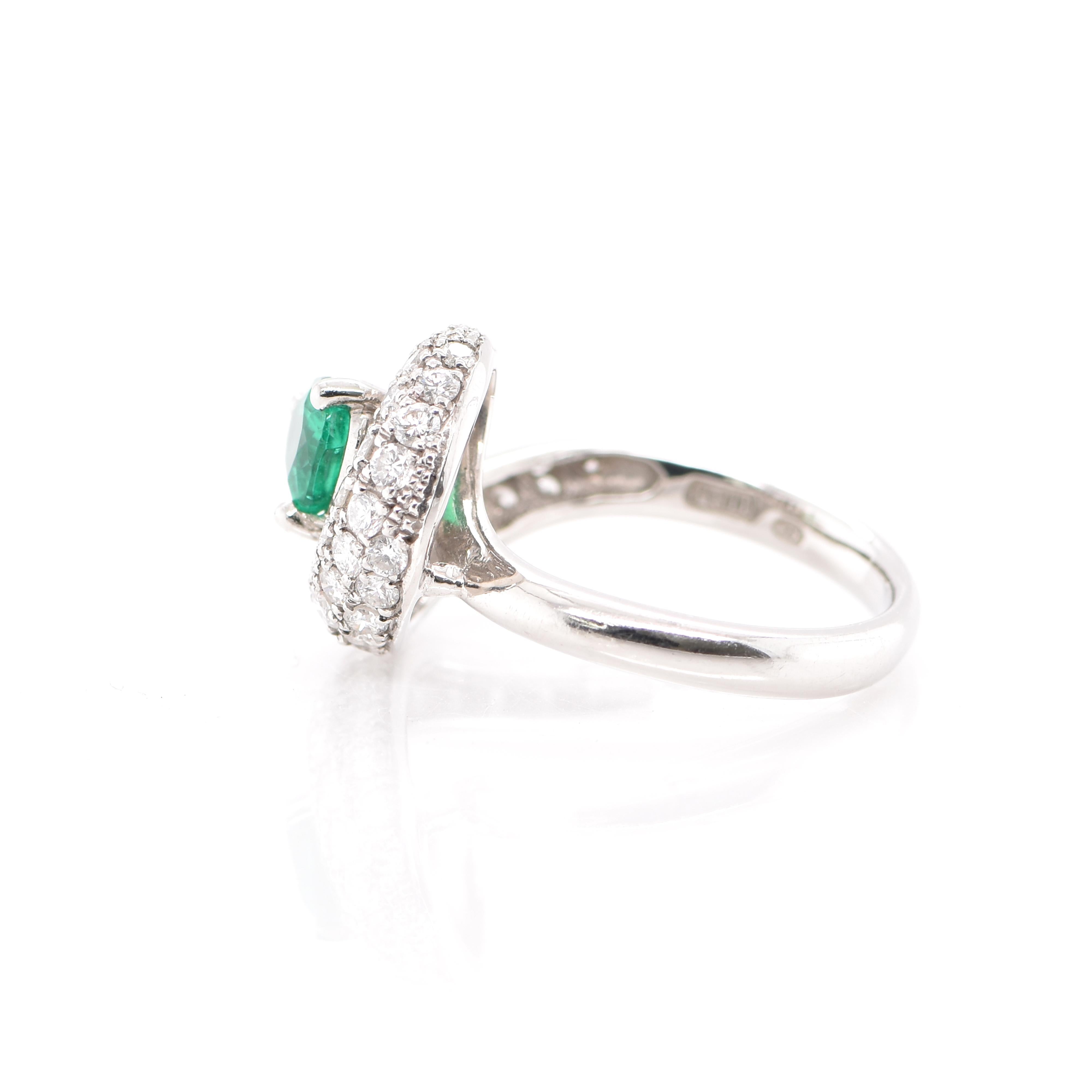 Trillion Cut 0.64 Carat Natural Emerald and Diamond Ring Set in Platinum
