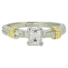 0.64 Carat Emerald Cut Diamond Engagement Ring