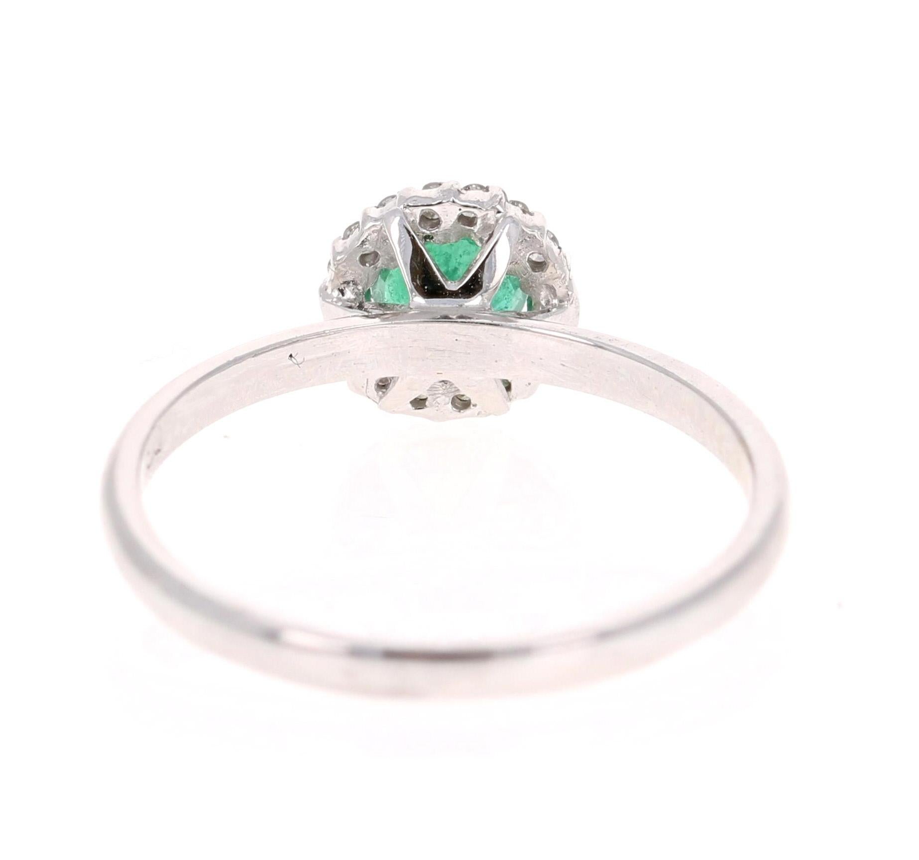 Round Cut 0.64 Carat Emerald Diamond White Gold Cluster Ring