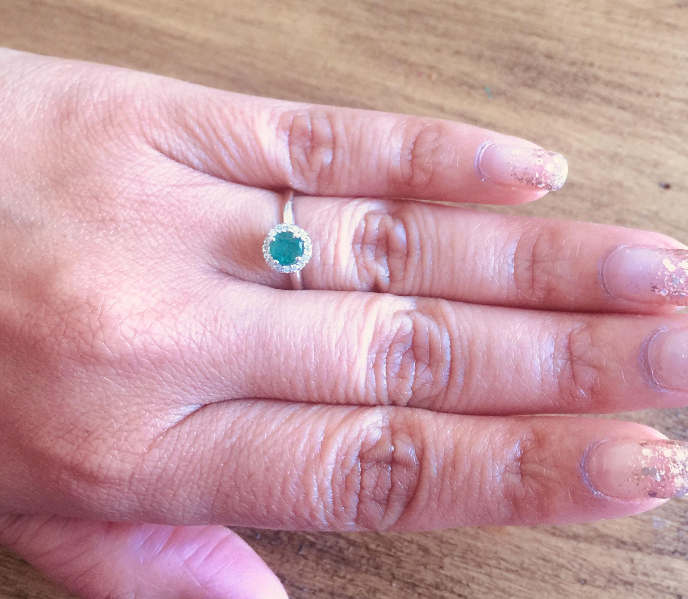 Women's 0.64 Carat Emerald Diamond White Gold Cluster Ring