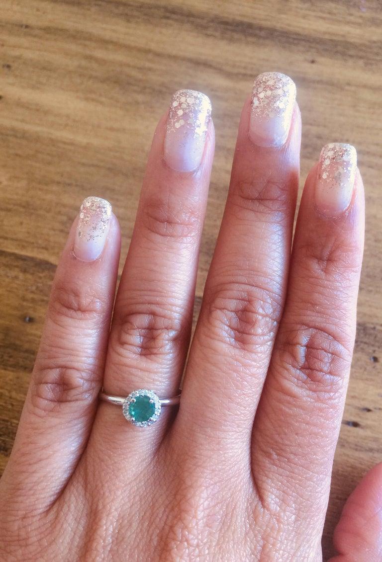 Modern 0.64 Carat Emerald Diamond White Gold Ring For Sale