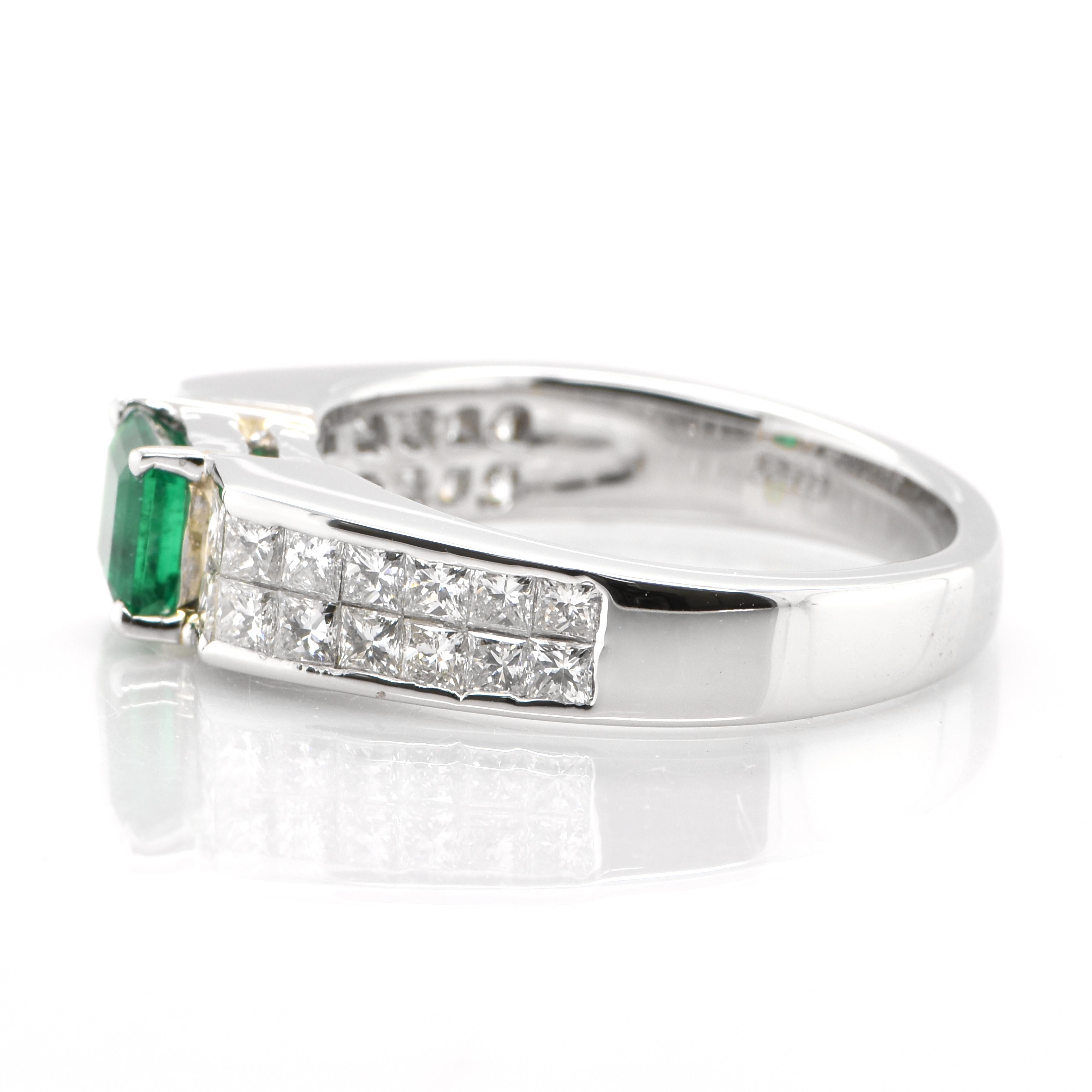 Emerald Cut 0.64 Carat Natural Emerald and Diamond Ring Set in Platinum For Sale