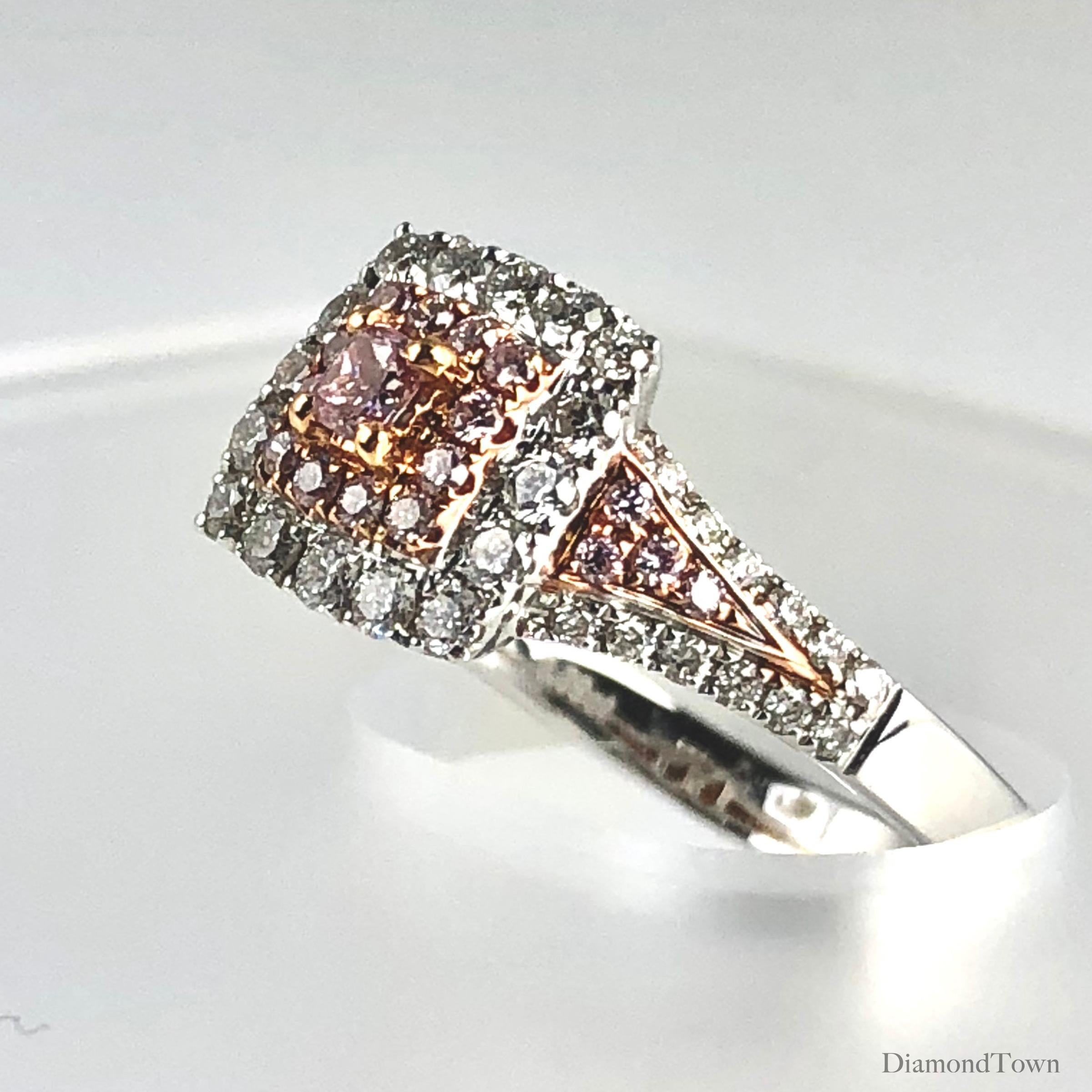 (DiamondTown) This gorgeous halo ring features a 0.09 carat Natural Pink Diamond center, surrounded by a square double halo of round pink and round white diamonds. The total diamond weight is 0.64 carats.

This ring can be professionally sized to