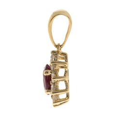 0.64 Carat Oval-Cut Ruby with Diamond Accents 14K Yellow Gold Pendant