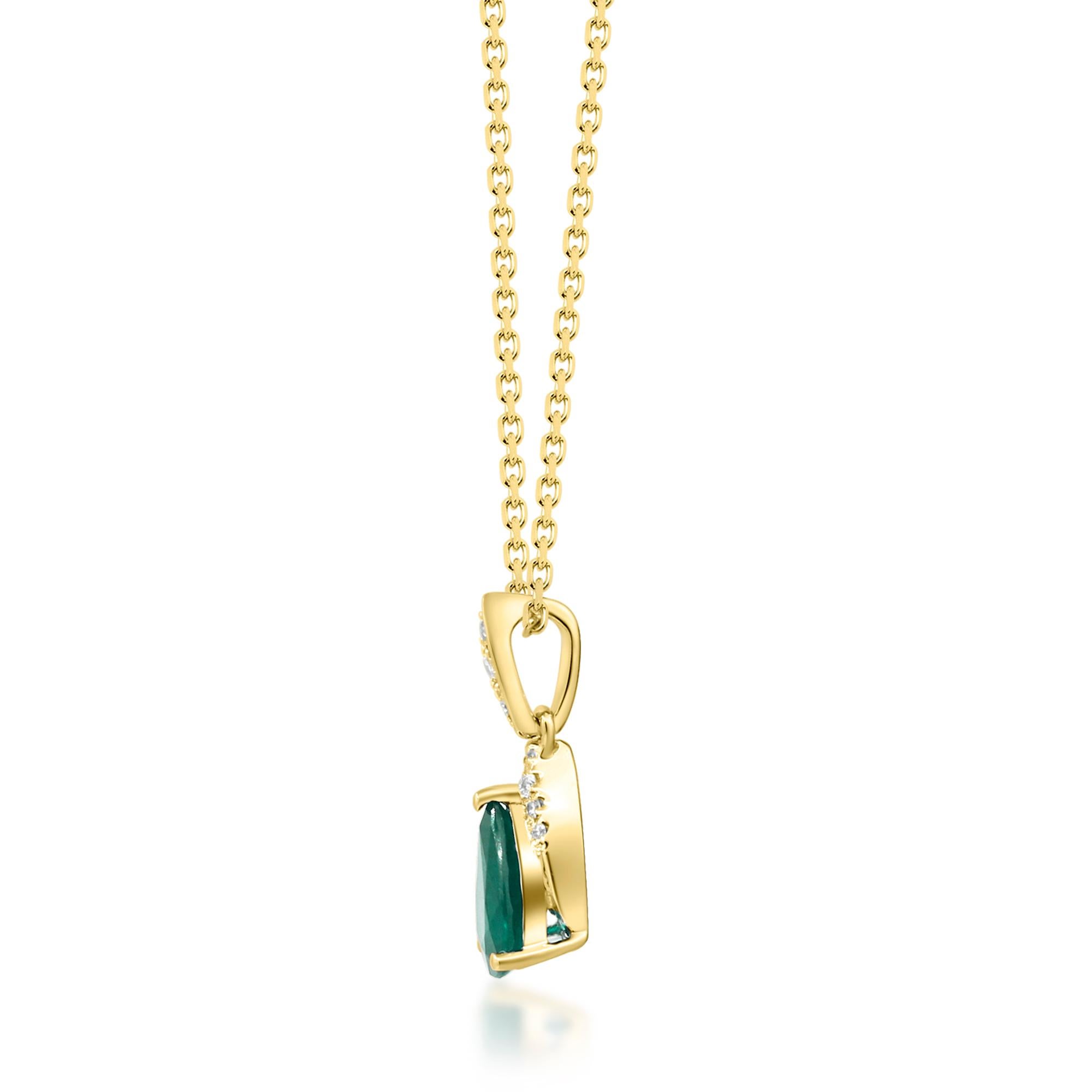 Pear Cut 0.64 Carat Pear-Cut Emerald with Diamond Accents 10K Yellow Gold Pendant For Sale