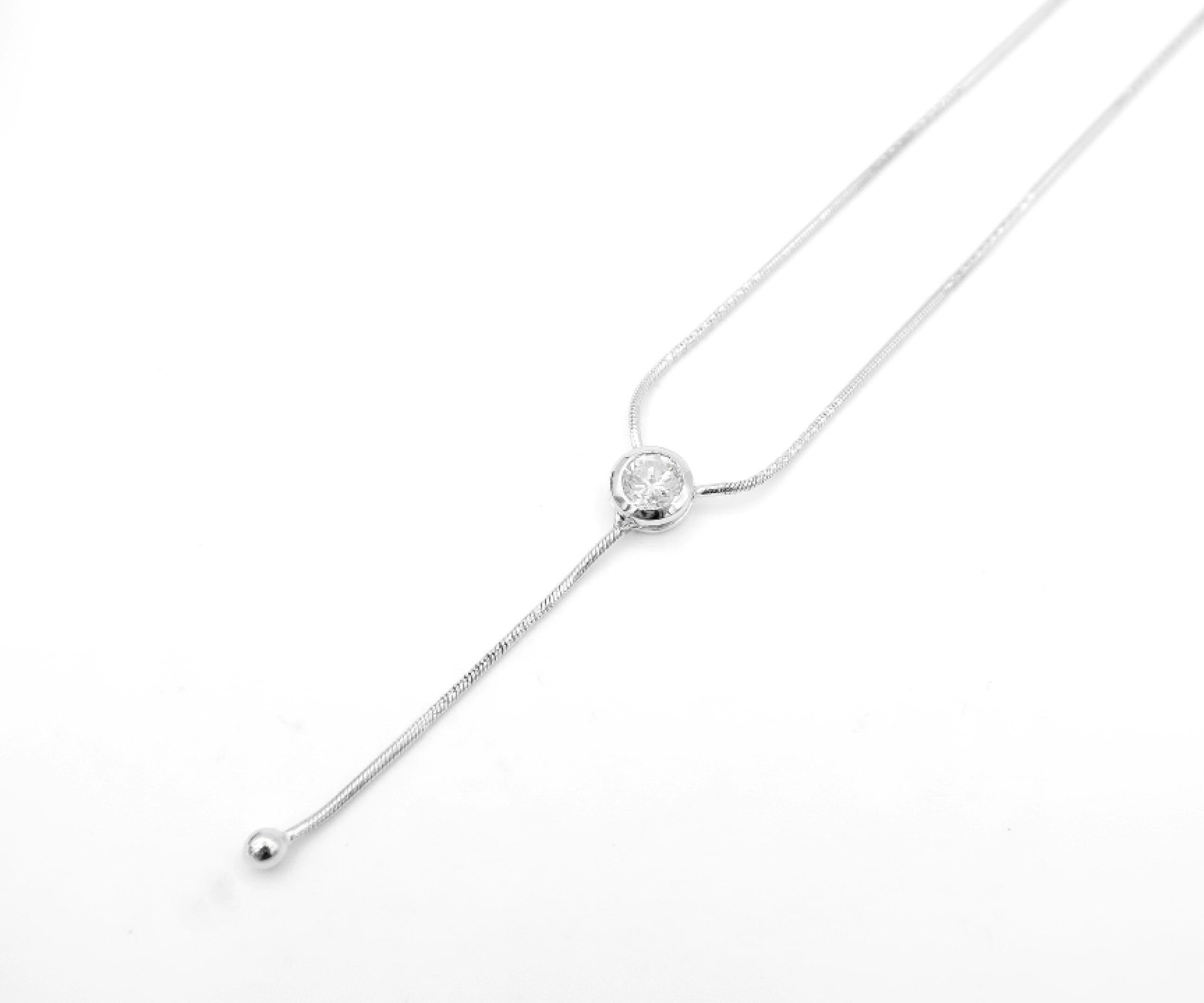 Contemporary 0.64 Carat Solitaire Bezel-Set Diamond 18K White Gold Y-Necklace For Sale