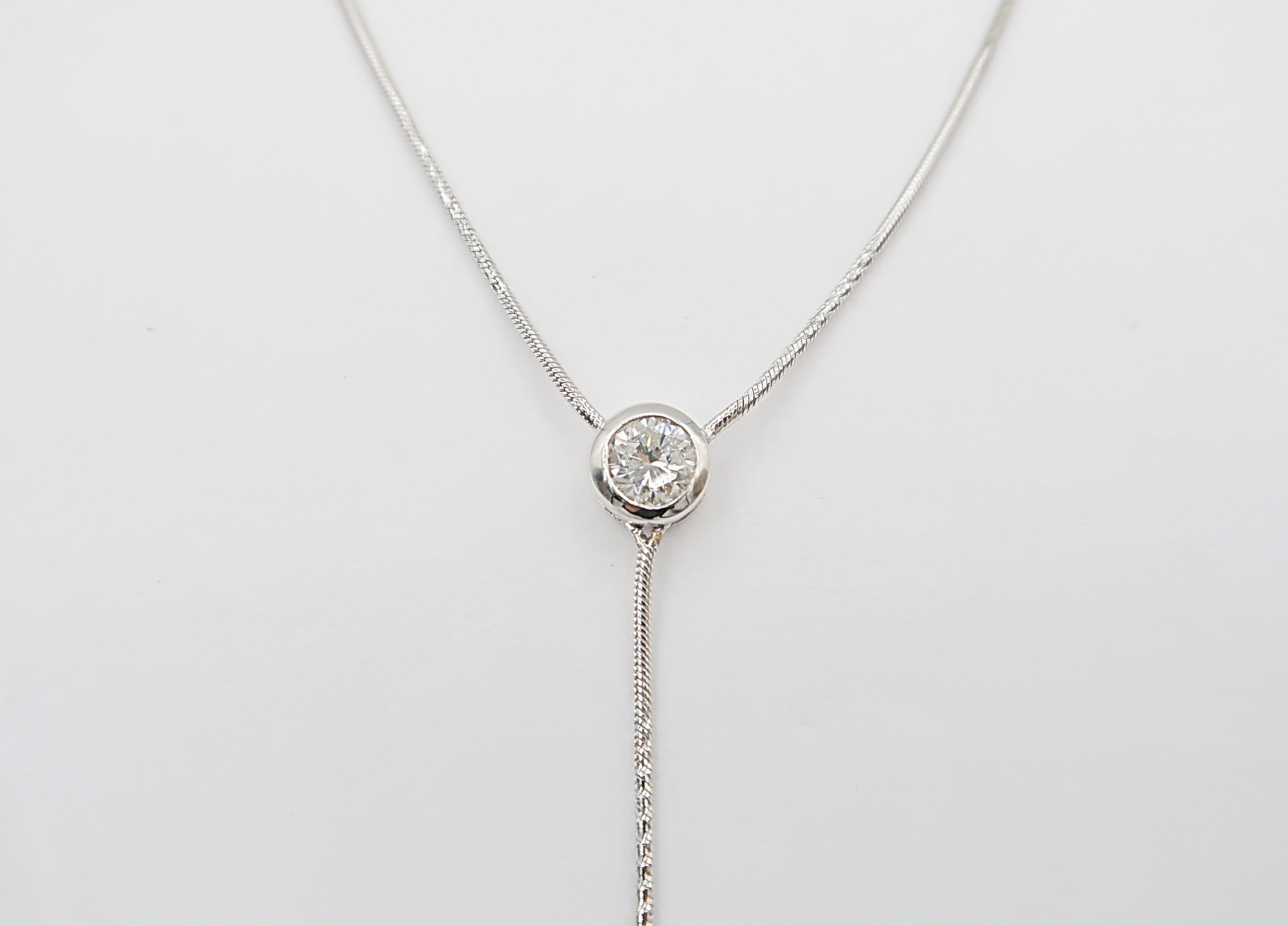 Brilliant Cut 0.64 Carat Solitaire Bezel-Set Diamond 18K White Gold Y-Necklace For Sale