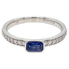0.64 Carats Sapphire Baguette Bezel Solitaire Ring with Diamonds 