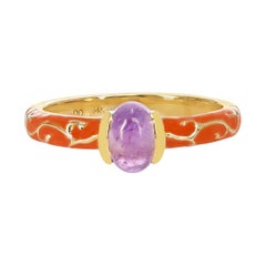 0.64 Ct. Oval Amethyst Cabochon with Orange Enamel with Gold Design, 14k