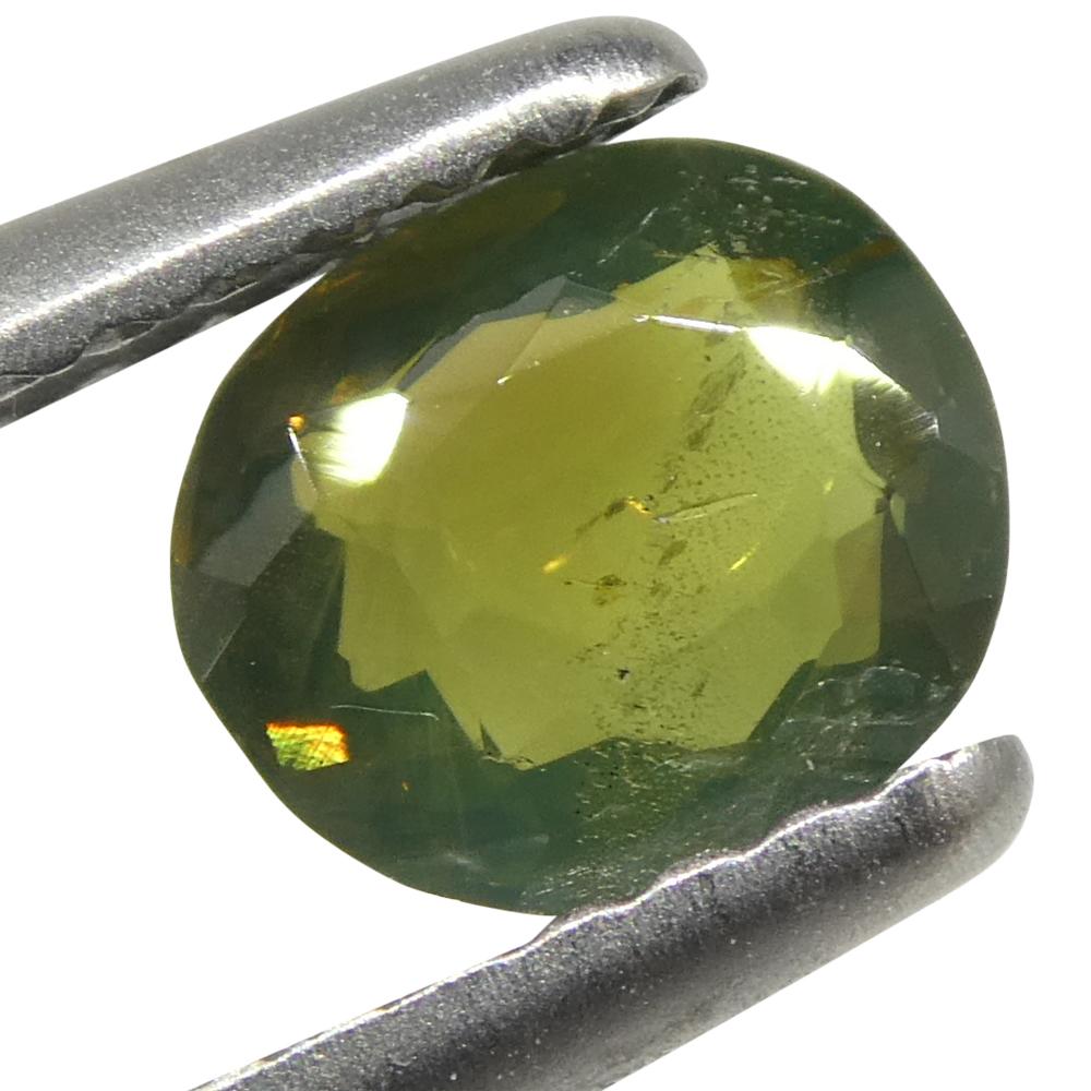 0.64ct Oval Yellowish Green to Yellowish Brown Alexandrite from Sri Lanka In New Condition For Sale In Toronto, Ontario