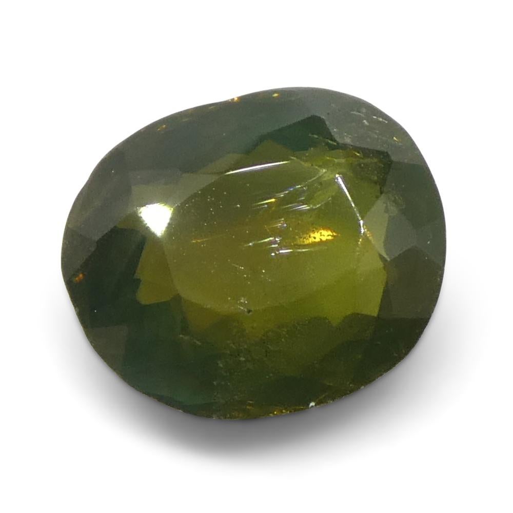 Women's or Men's 0.64ct Oval Yellowish Green to Yellowish Brown Alexandrite from Sri Lanka For Sale