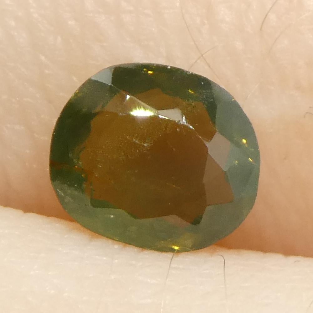 0.64ct Oval Yellowish Green to Yellowish Brown Alexandrite from Sri Lanka For Sale 5