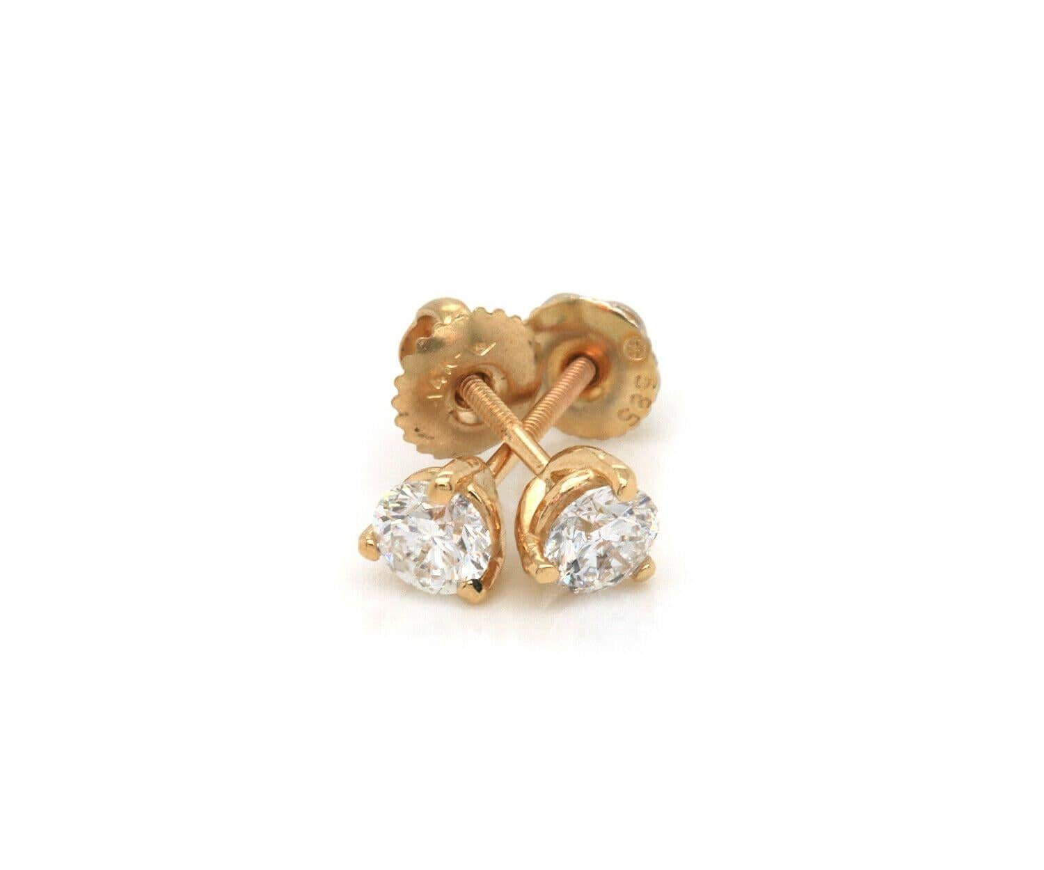 0.64ctw Diamond Solitaire Stud Earrings in 14K

Diamond Solitaire Stud Earrings
14K Yellow Gold
Diamonds Carat Weight: Approx. 0.64ctw
Weight: Approx. 1.13 Grams
Stamped: 585

Condition:
Offered for your consideration is a pair of previously owned