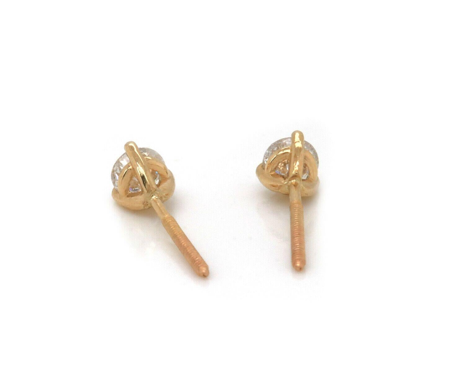 0.64ctw Diamond Solitaire Stud Earrings in 14K Yellow Gold In Excellent Condition For Sale In Vienna, VA