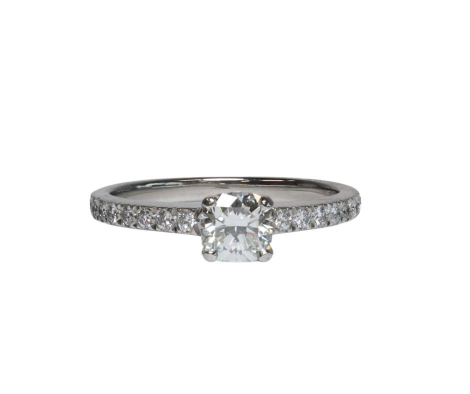 Indulge in timeless elegance with this exquisite Tiffany & Co. Novo Cushion Cut Engagement Ring Set in Platinum. Crafted with precision and passion, this ring epitomizes sophistication and everlasting love.
Adorned with a stunning cushion-cut