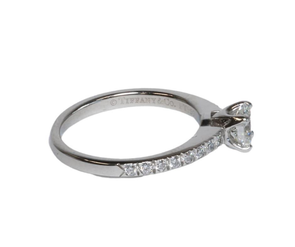 Modern 0.64ctw Tiffany & Co Cushion Cut Engagement Ring with Pave Diamond Platinum Ring For Sale