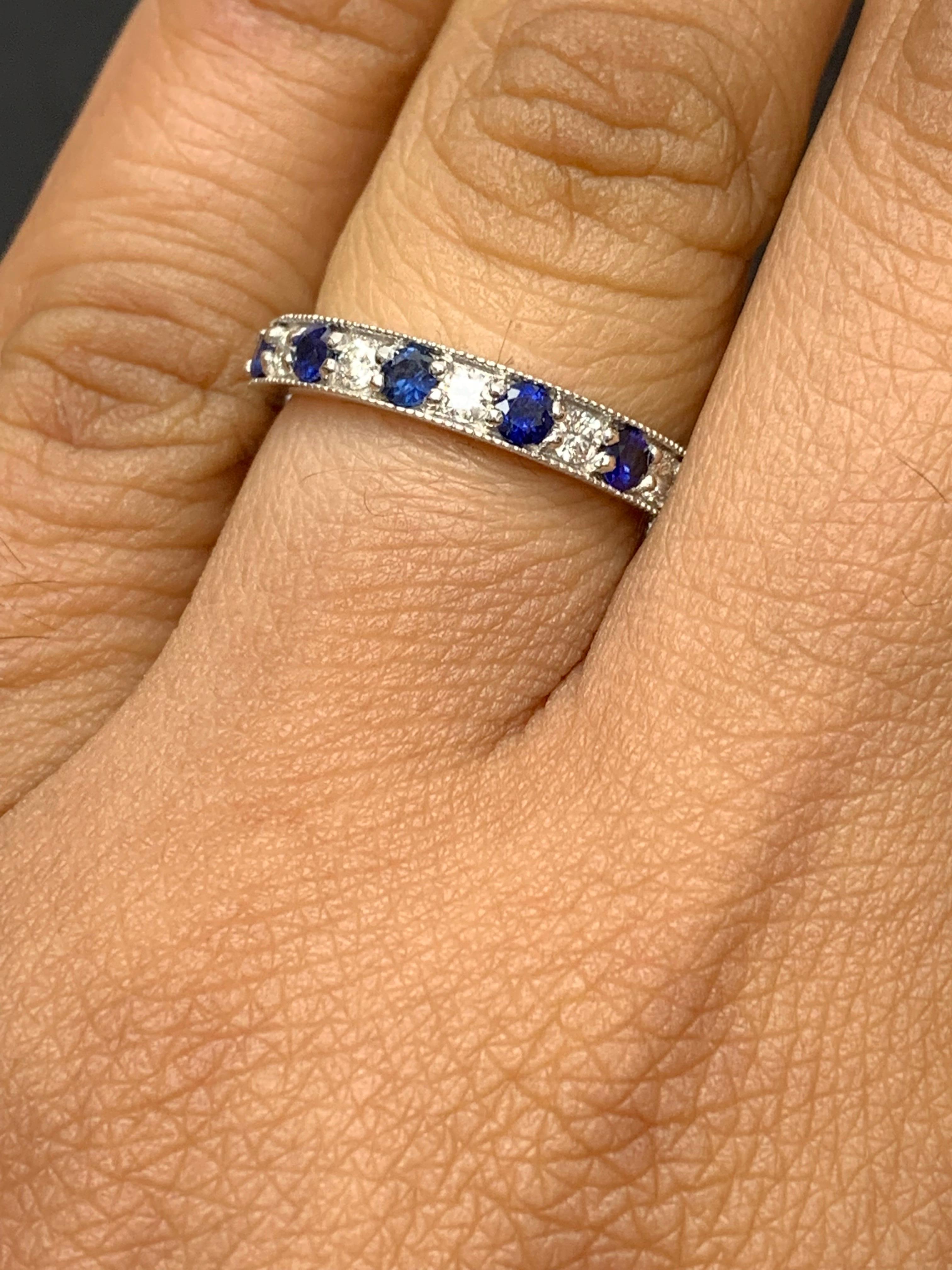 Handcrafted to perfection; showcasing color-rich brilliant-cut blue sapphires that elegantly alternate brilliant-cut diamonds in a 14k white gold setting. 
The 7 Blue Sapphires weigh 0.65 carats total and 6 diamonds weigh 0.30 carats total.

Size