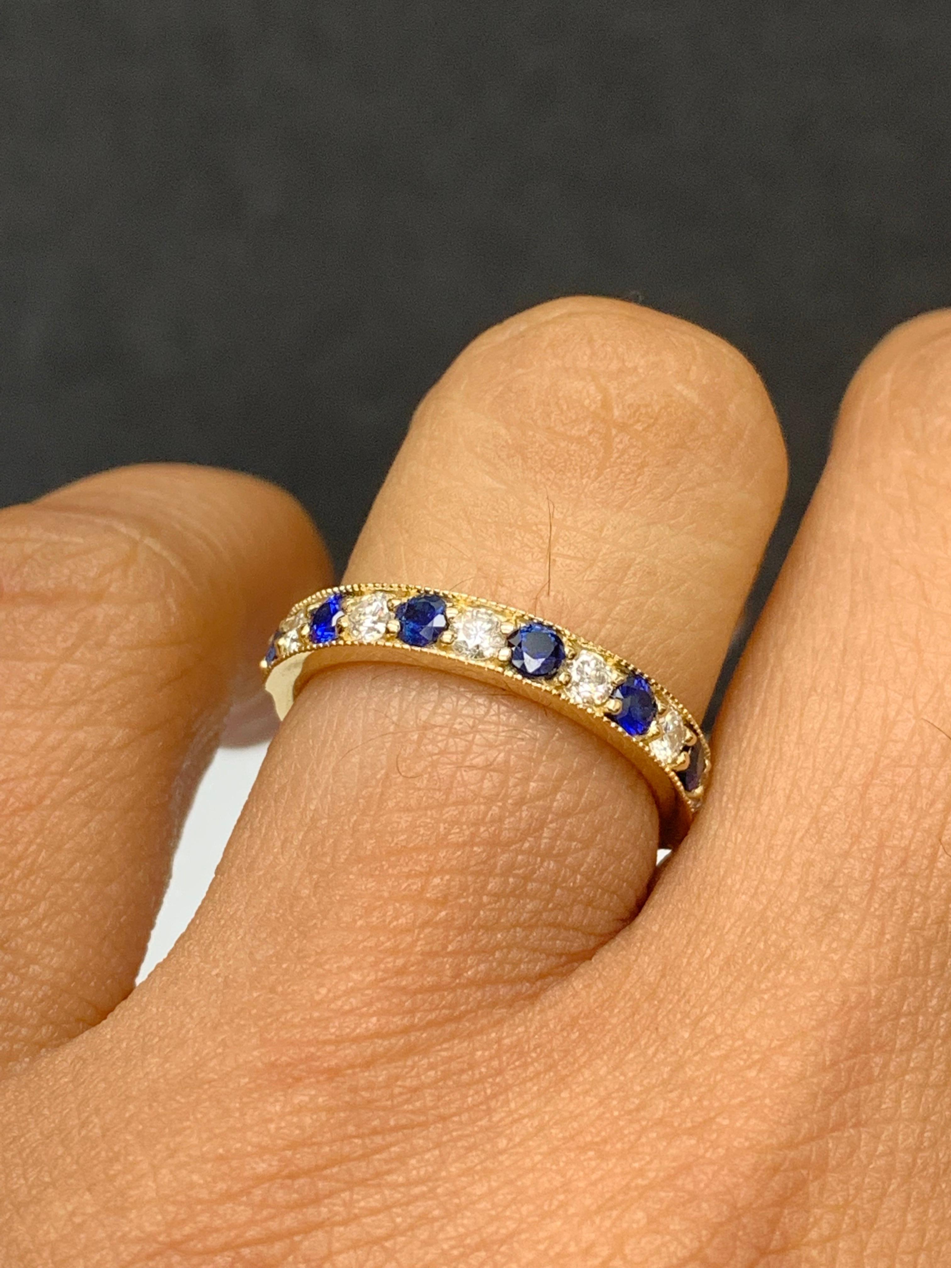 Contemporary 0.65 Carat Brilliant Cut Blue Sapphire and Diamond Band in 14K Yellow Gold For Sale