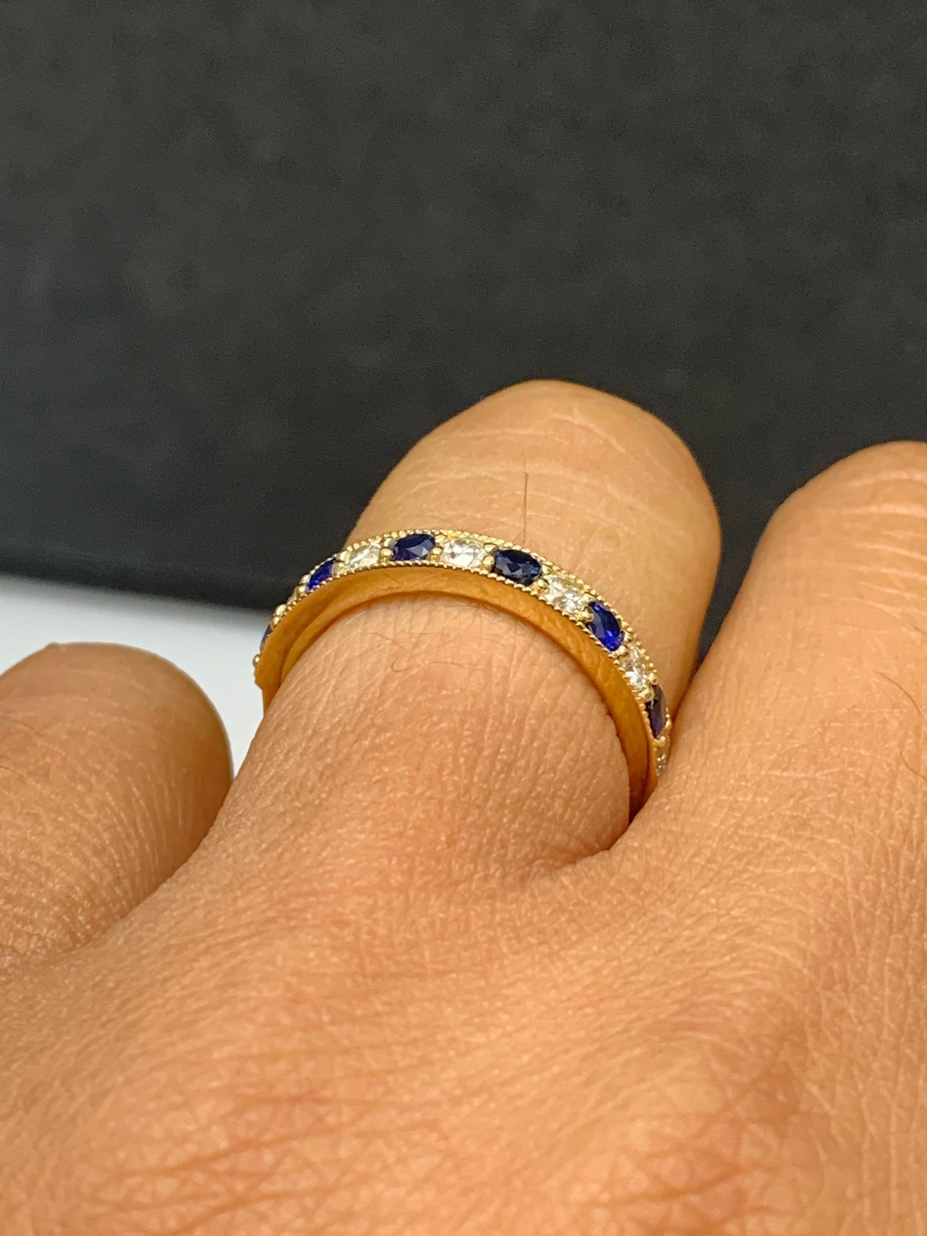 0.65 Carat Brilliant Cut Blue Sapphire and Diamond Band in 14K Yellow Gold In New Condition For Sale In NEW YORK, NY