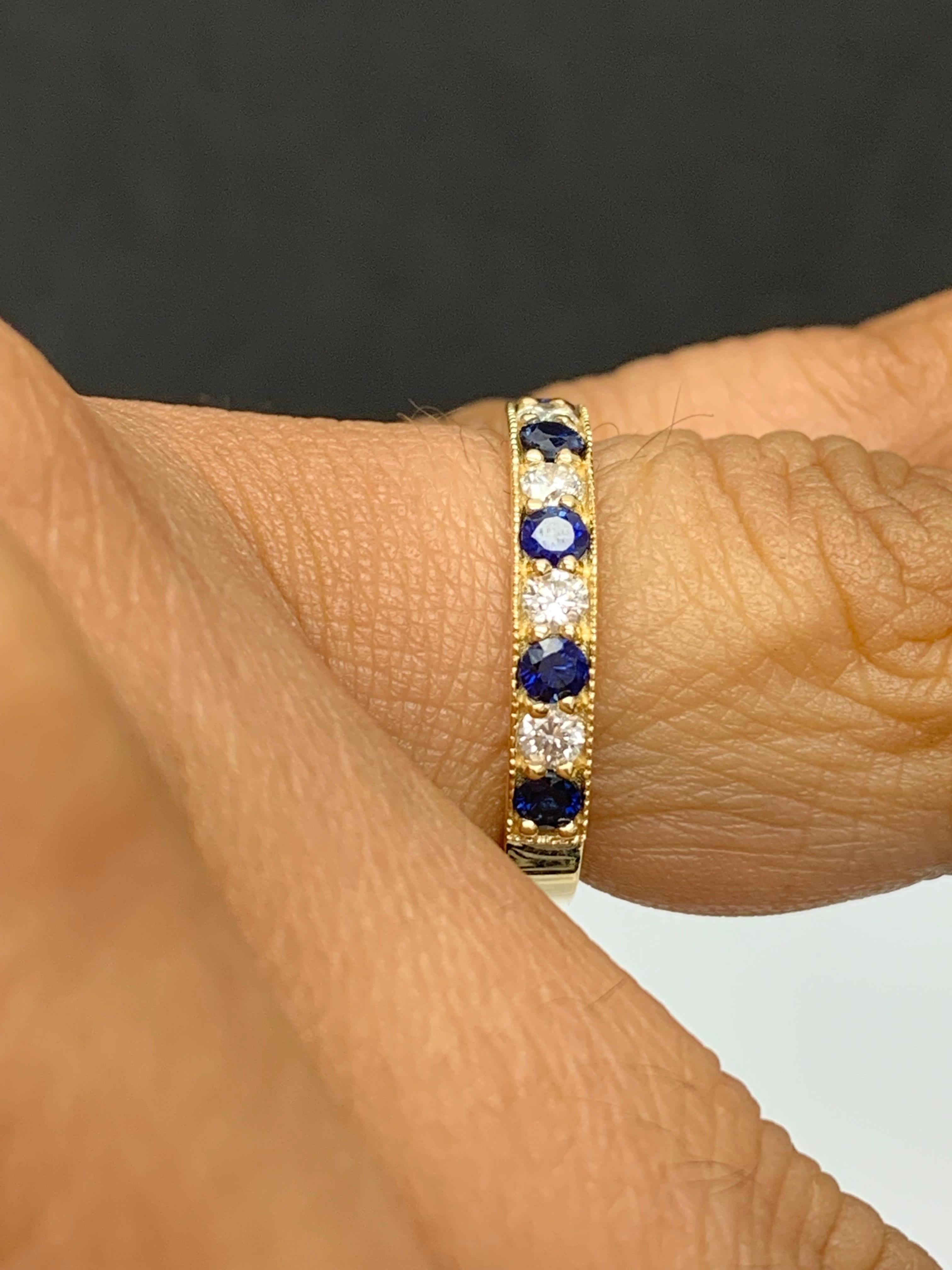0.65 Carat Brilliant Cut Blue Sapphire and Diamond Band in 14K Yellow Gold For Sale 1