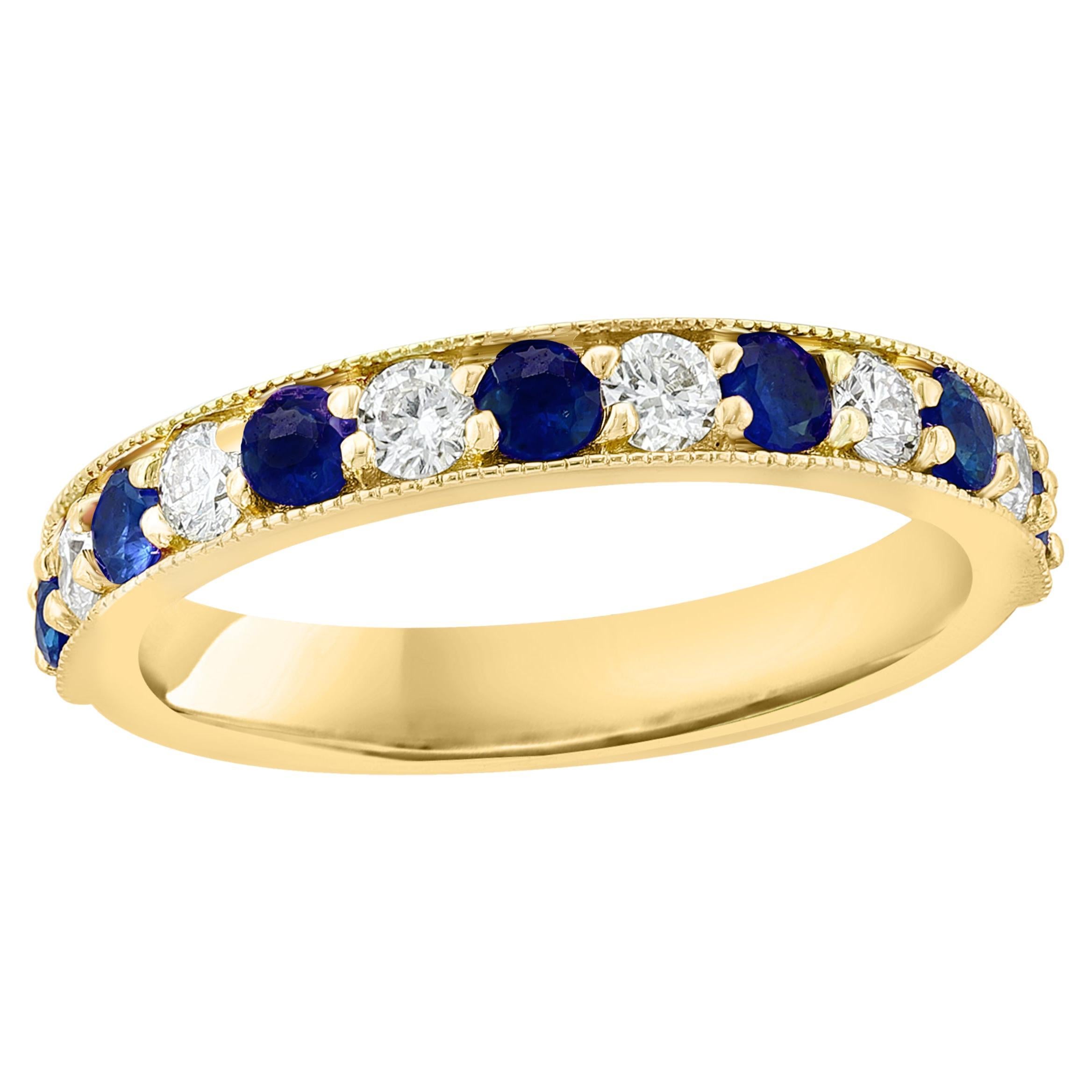 0.65 Carat Brilliant Cut Blue Sapphire and Diamond Band in 14K Yellow Gold For Sale