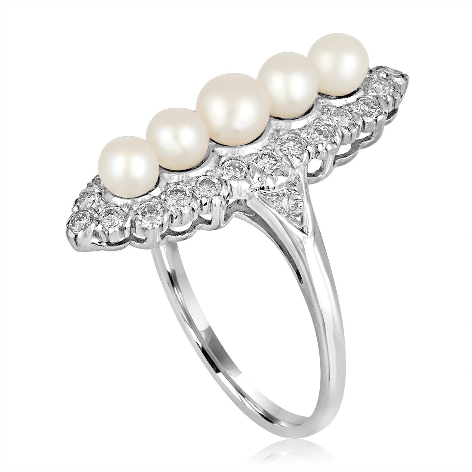 Pearl & Diamond Ring.
The ring is 18K White Gold.
There are 0.65 Carats in Diamonds H SI.
There are 5 Cultured Freshwater Pearls 3.7mm-4.3mm.
The ring measures 1