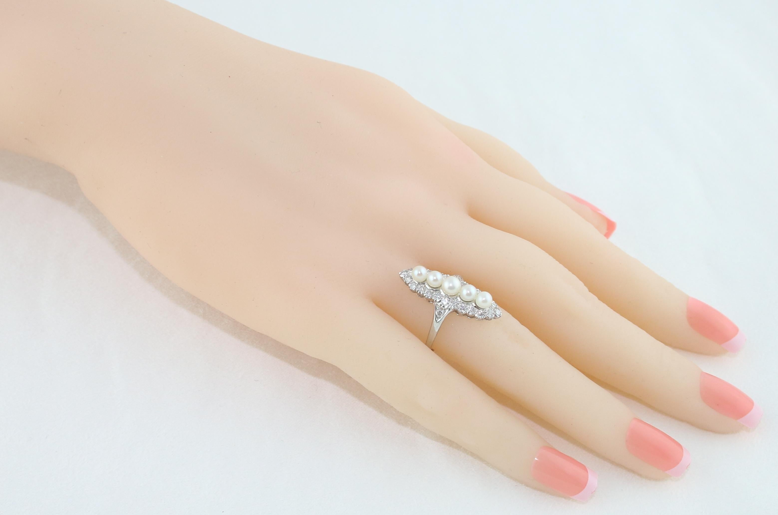 Round Cut 0.65 Carat Diamond and Pearl Gold Ring For Sale