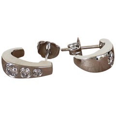 Pendientes engastados con bisel de diamantes de 0,65 quilates, Ben Dannie