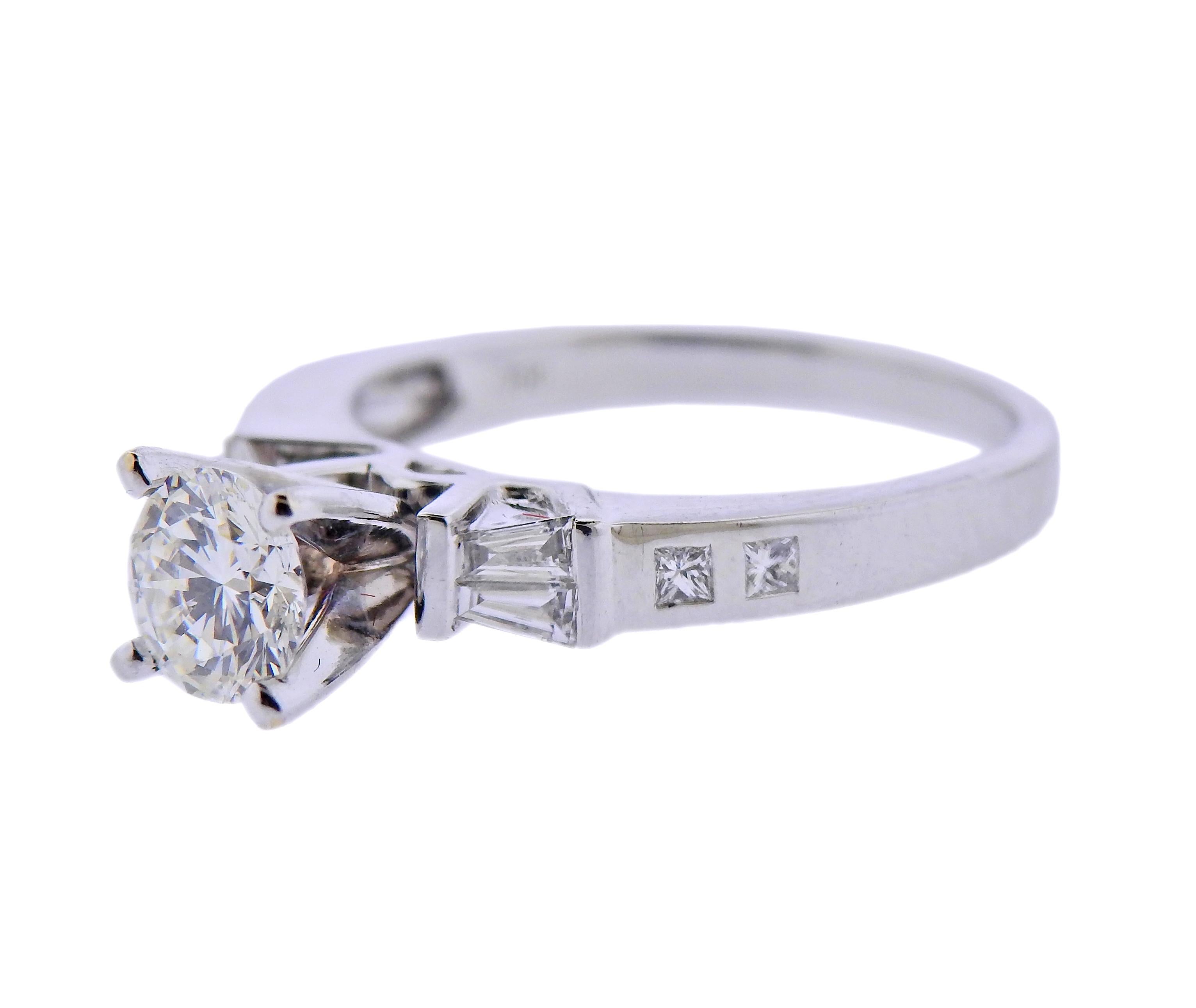 18k white gold engagement ring, with center approx. 0.65ct H-I/VS1-VS2 diamond, and 0.24cts in side diamonds. Ring size - 5.5. Marked: D024, 750. Weight - 3.6 grams. 