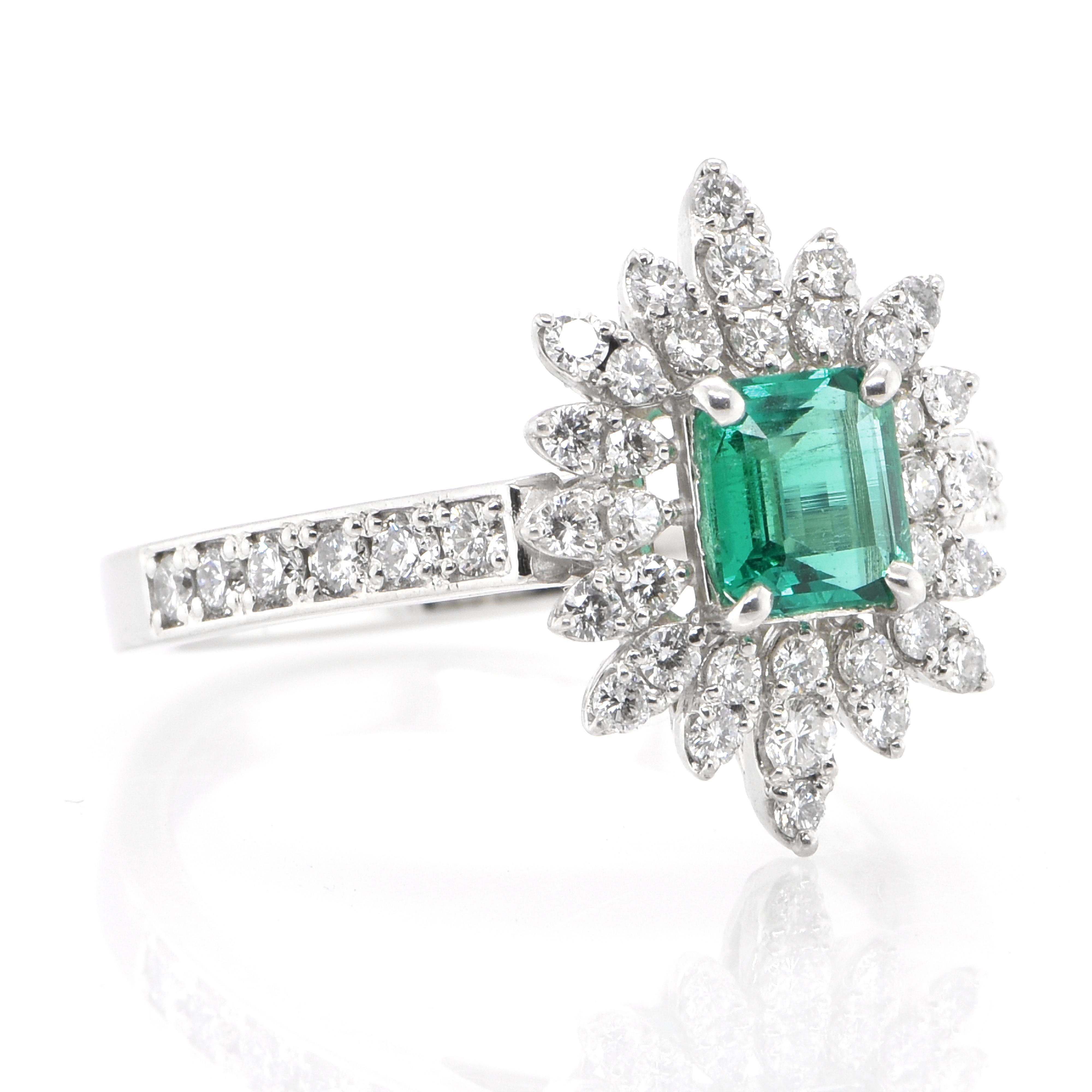 Modern 0.65 Carat Natural Emerald and Diamond Double Halo Ring Set in Platinum For Sale