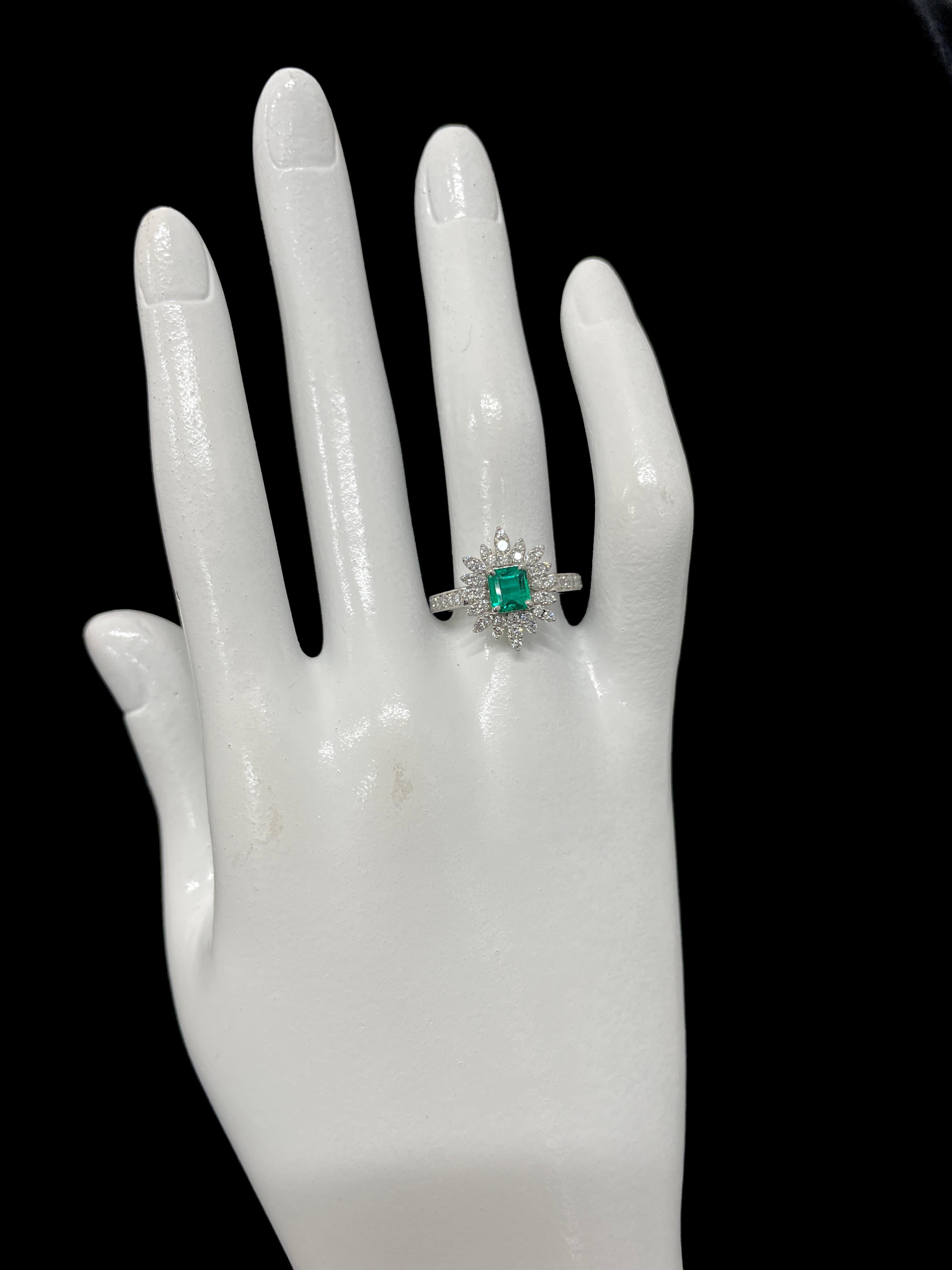 0.65 Carat Natural Emerald and Diamond Double Halo Ring Set in Platinum For Sale 1