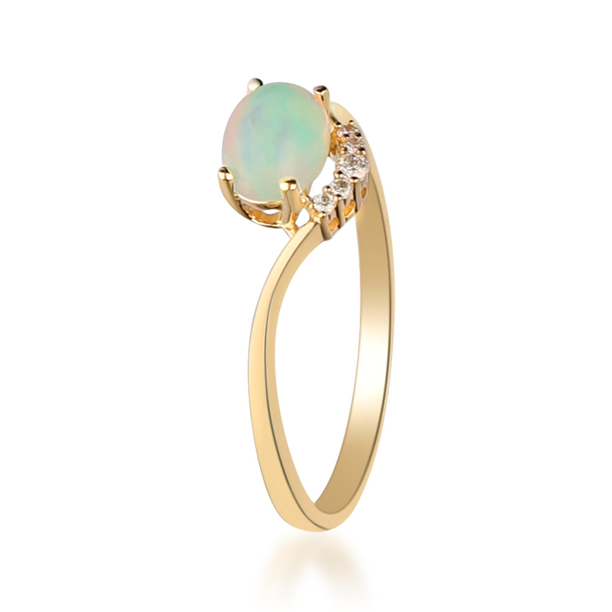 Art Deco 0.65 Carat Oval Cab Ethiopian Opal Diamond accents 14K Yellow Gold Ring. For Sale