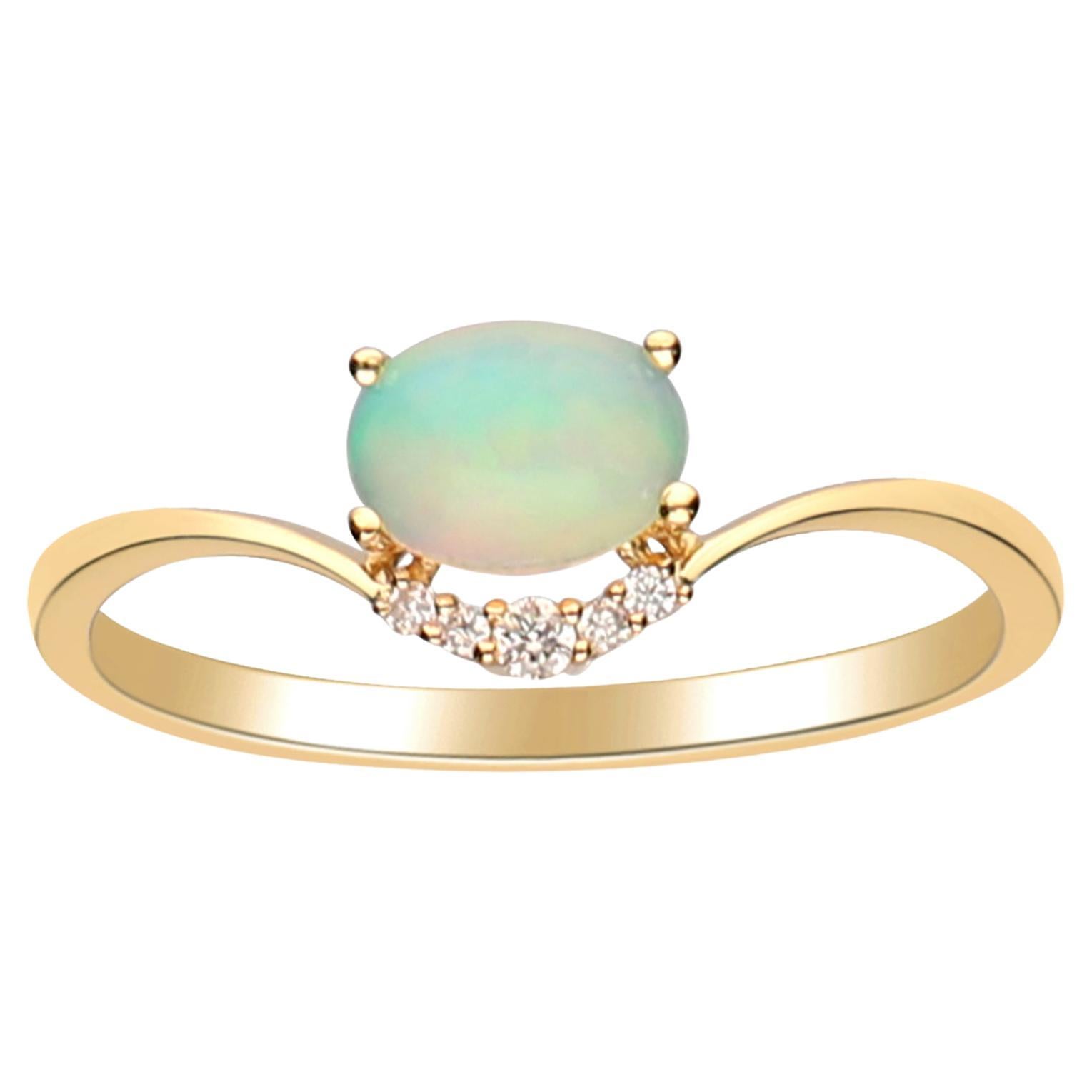 0.65 Carat Oval Cab Ethiopian Opal Diamond accents 14K Yellow Gold Ring. For Sale