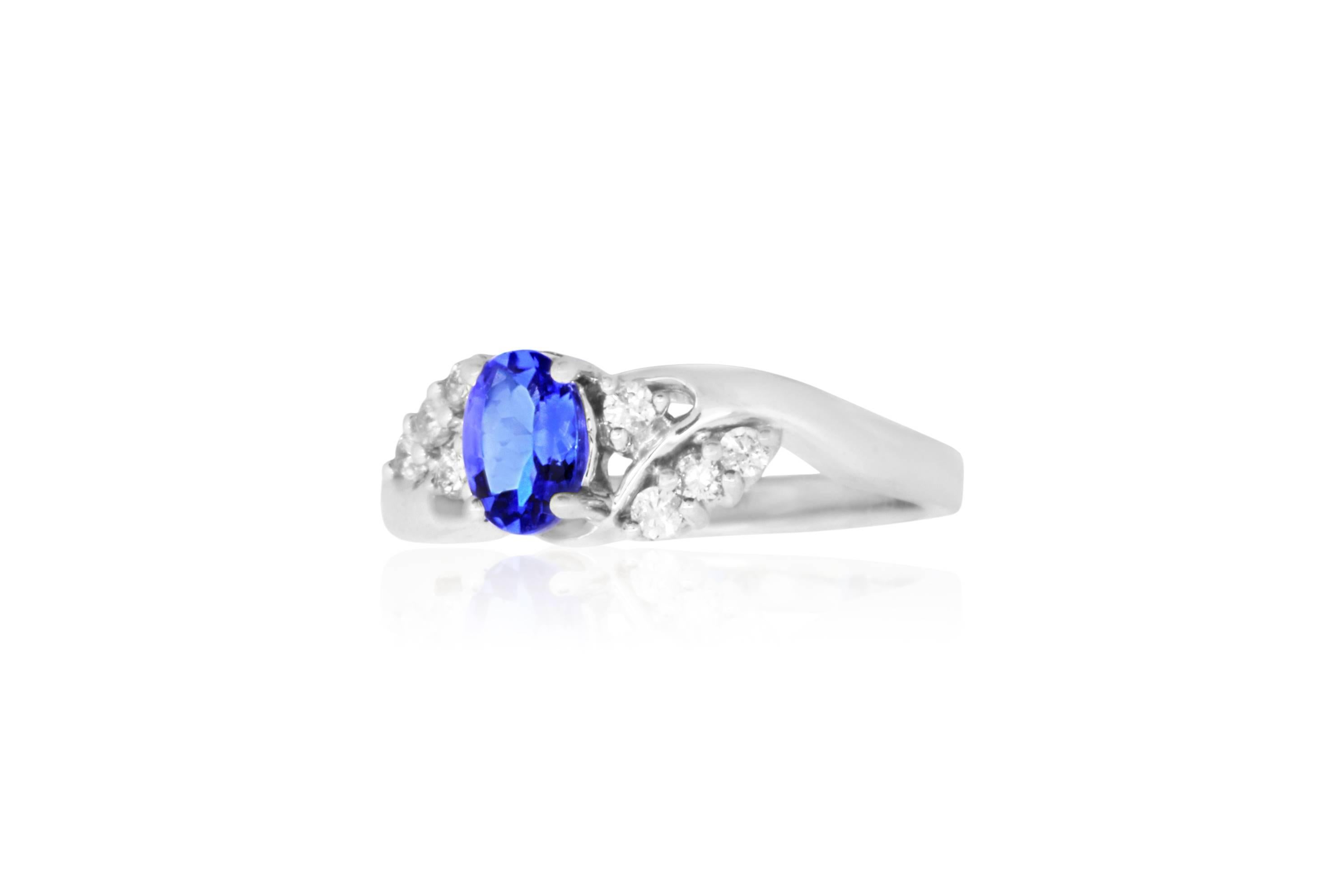With a beautiful & chic design, you will fall in love with this 0.65 carat Oval shaped Tanzanite. Framed with 8 white diamonds totaling 0.15 carats, this bold blue ring is perfect for color jewelry lovers everywhere. 

Material: 14k White