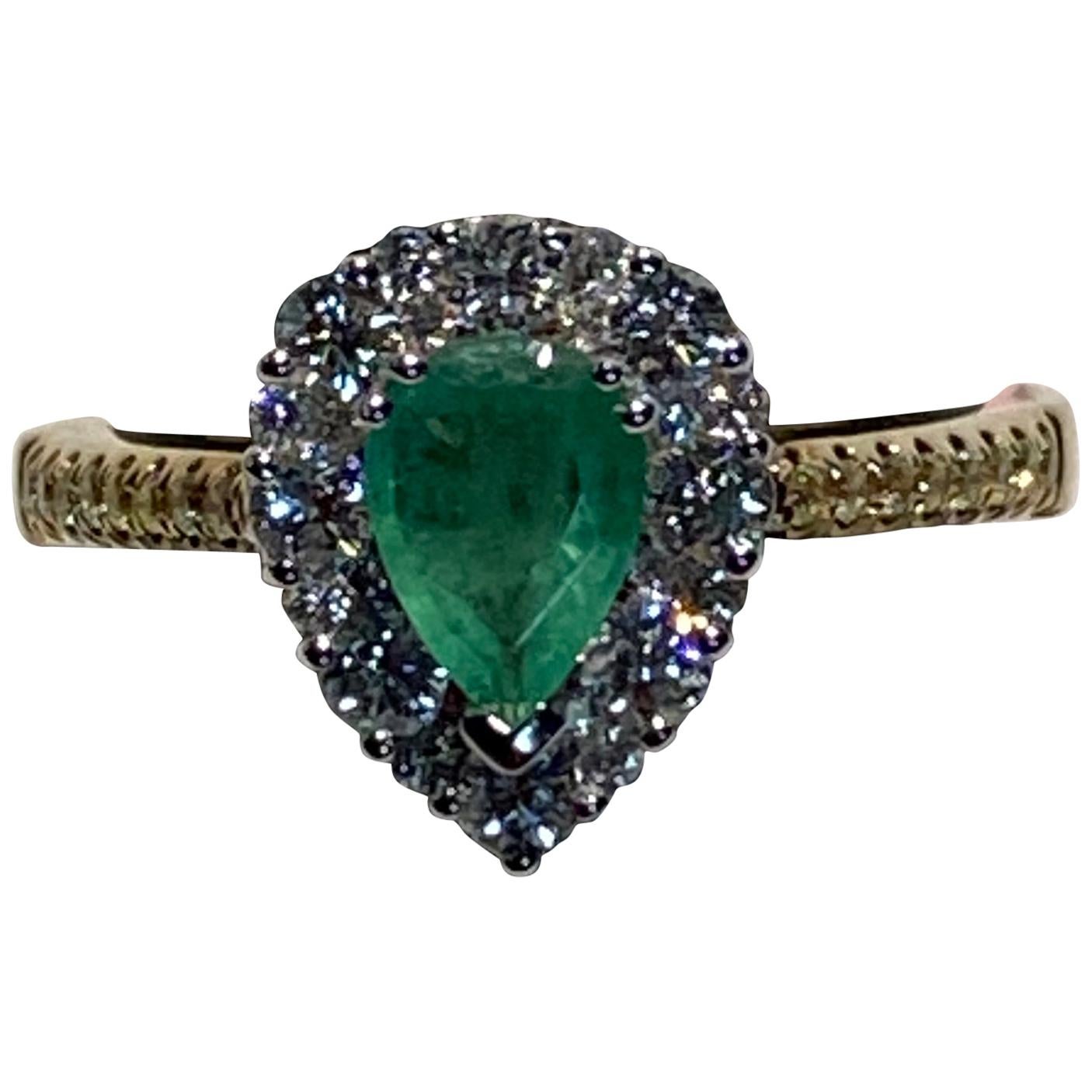 0.65 Carat Pear Shaped Emerald Diamond Halo Ring