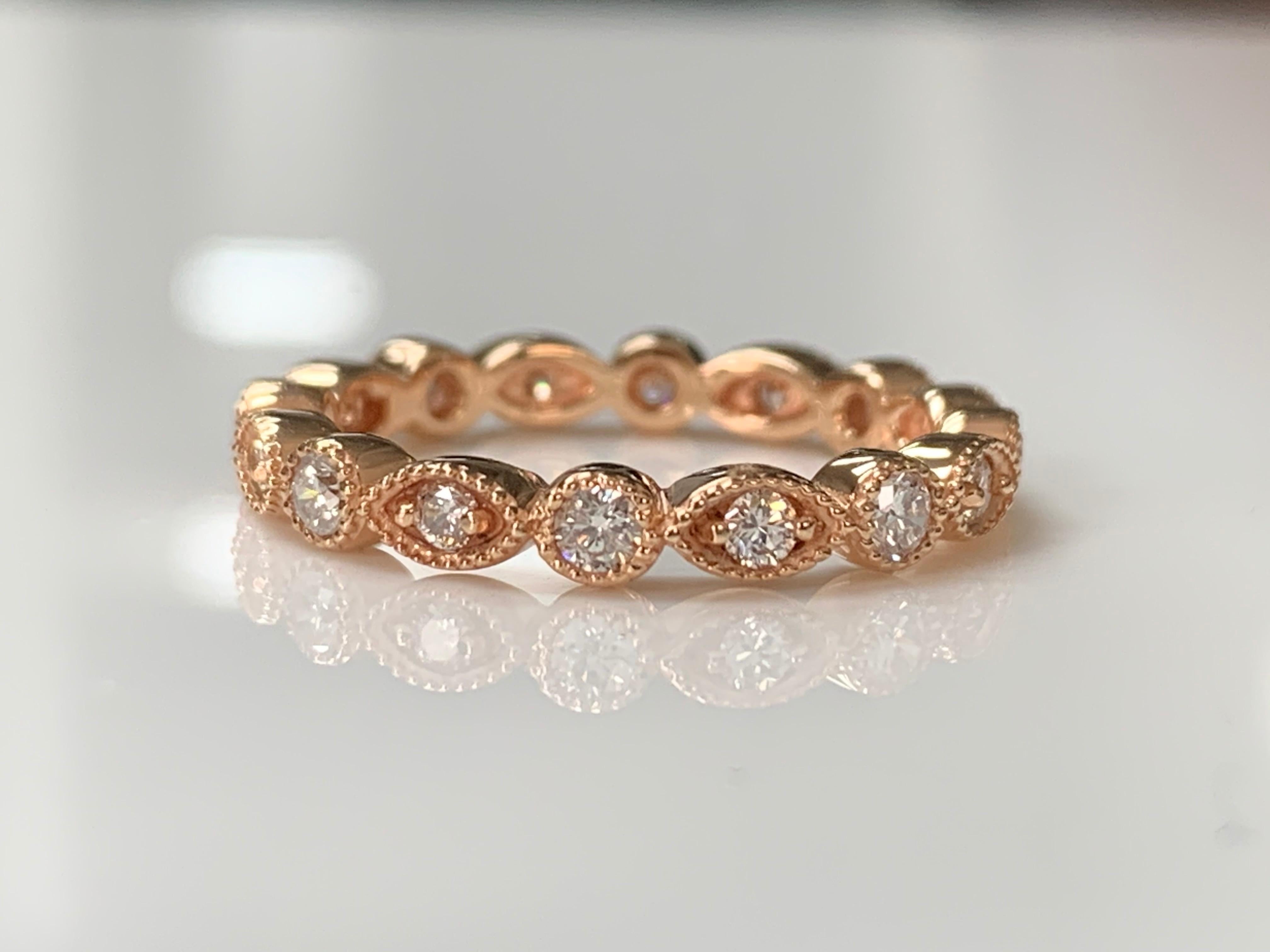 Beautiful Round Brilliant Diamond Eternity Band handcrafted in 14 k rose gold. 
The details are as follows : 
Diamond weight : 0.65 carat ( GH color and VS clarity ) 
Metal : 14K Rose gold 
Ring size : 6 3/4 

