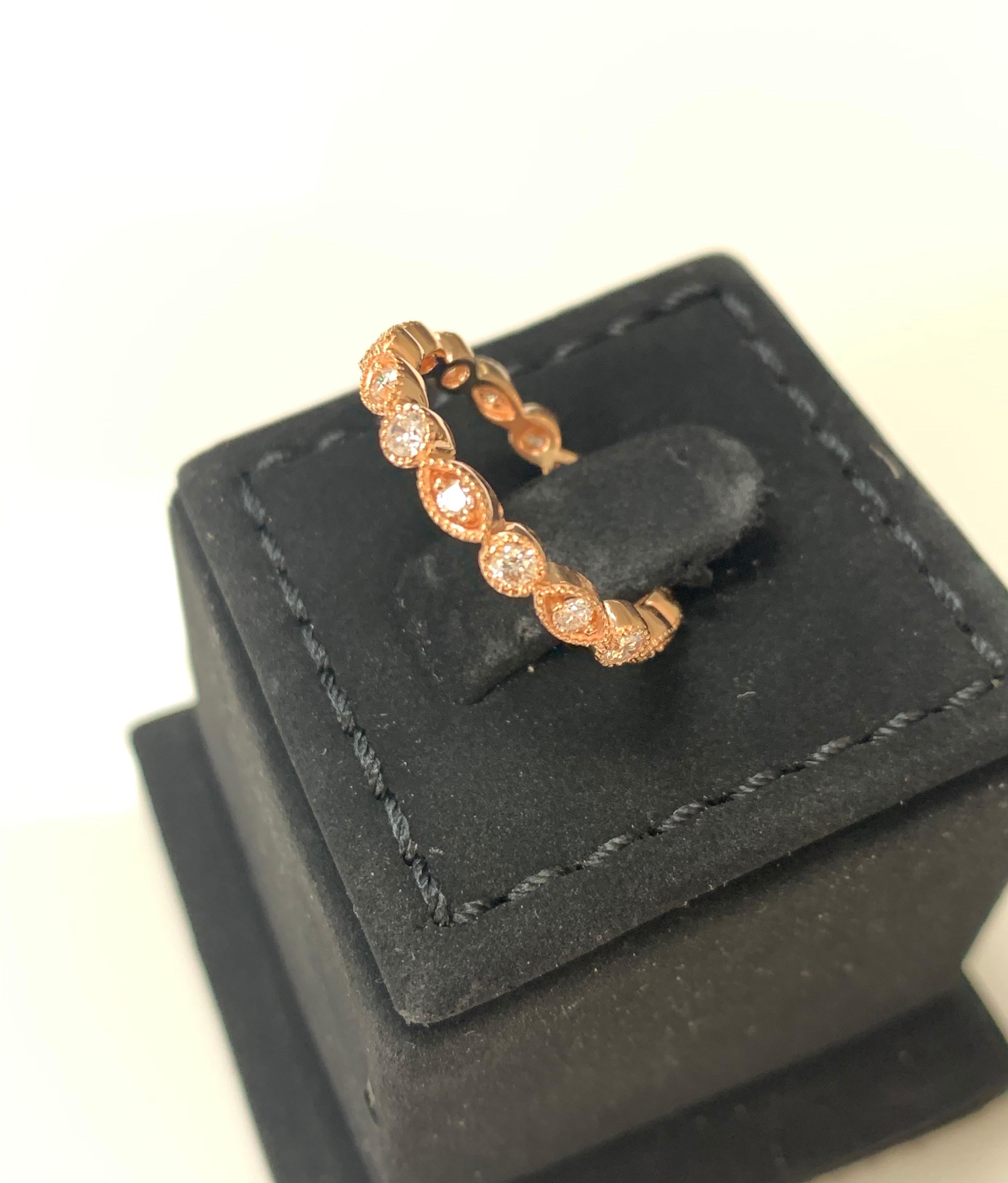Taille ronde Bracelet d'éternité en or rose 14 carats avec diamants ronds et brillants de 0,65 carat en vente