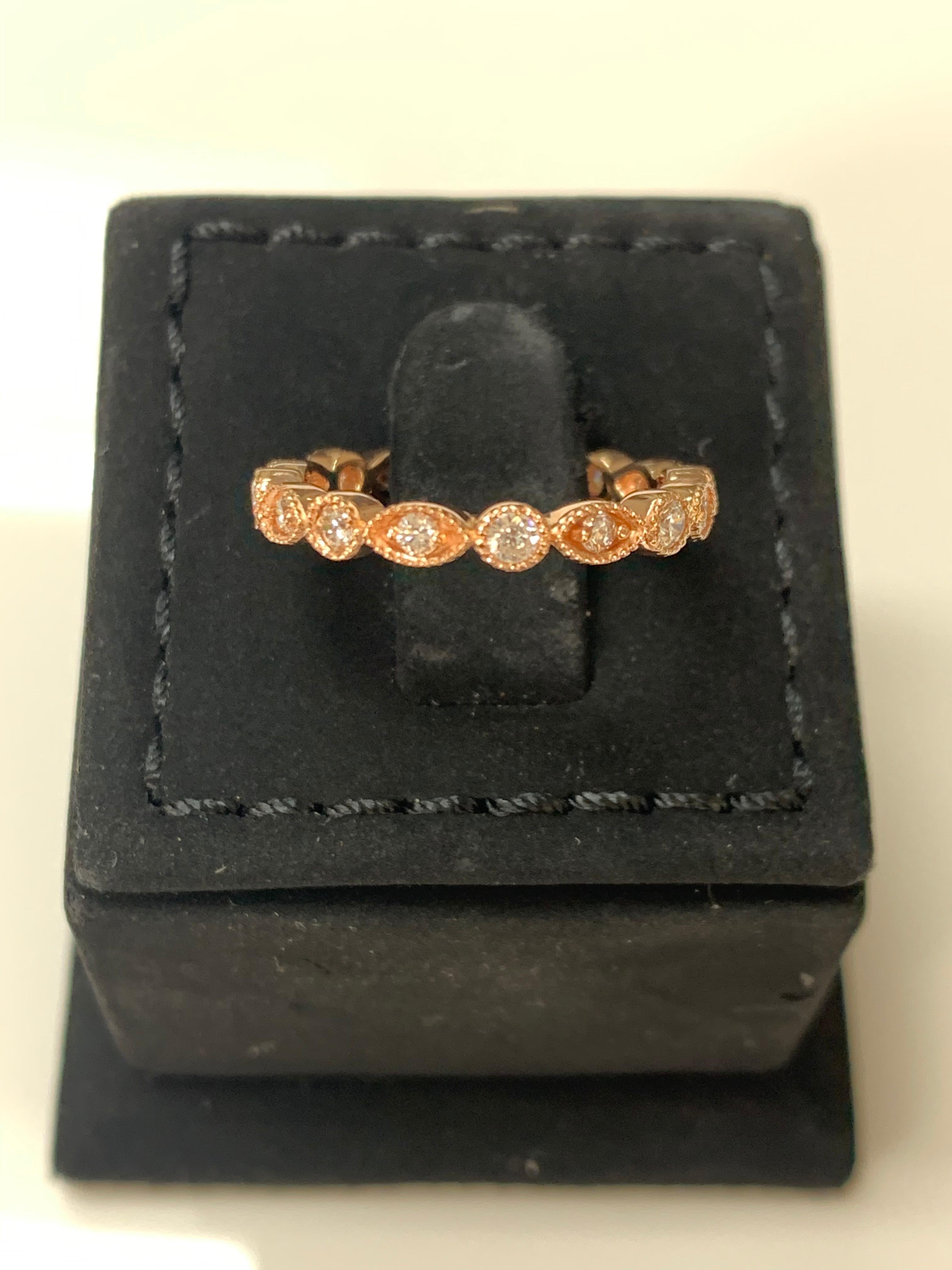 0.65 Carat Round Brilliant Diamond Eternity Band in 14 Karat Rose Gold In New Condition For Sale In New York, NY