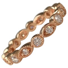 Anillo de diamante brillante redondo de 0,65 quilates en oro rosa de 14 quilates