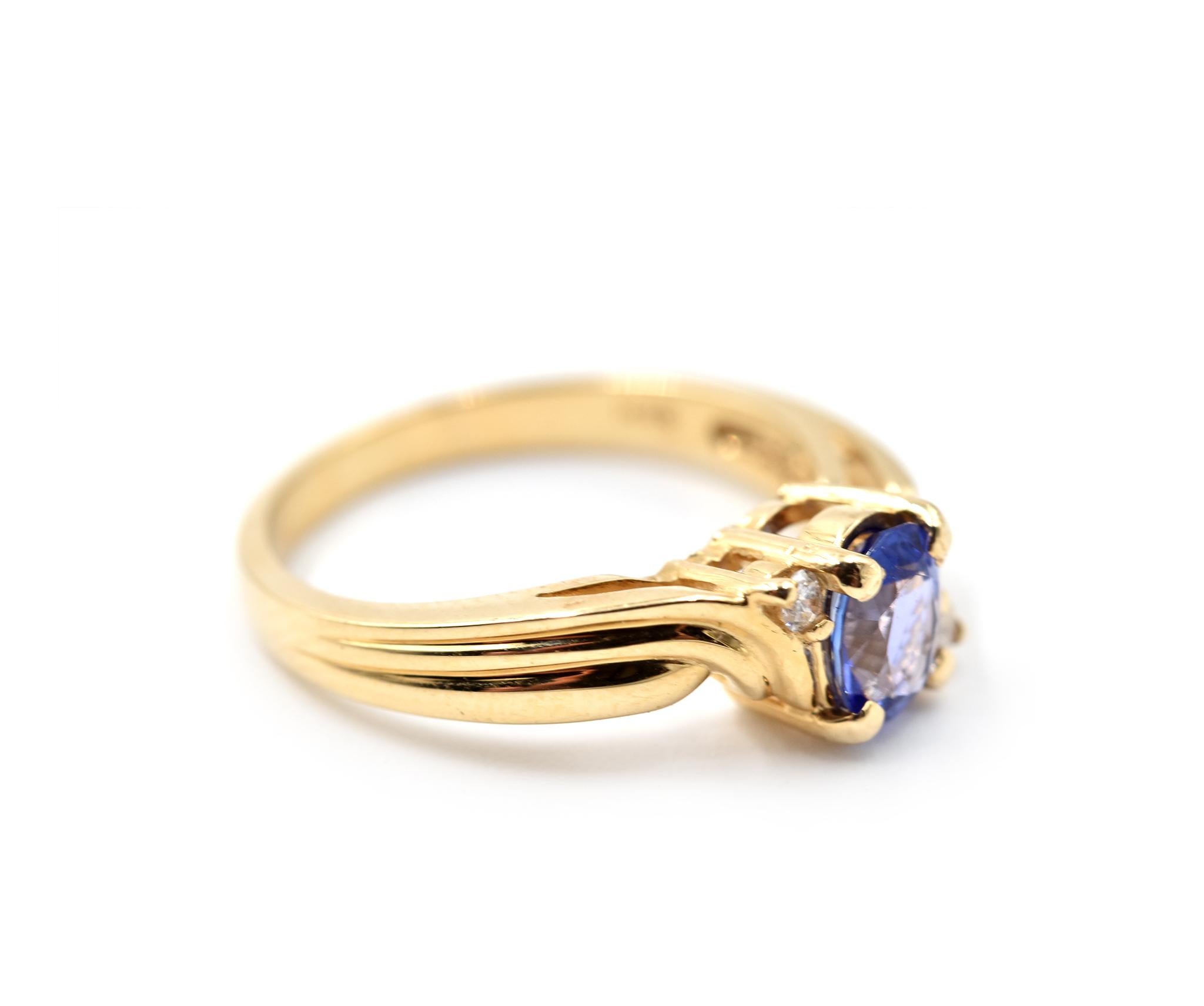 Designer: custom design
Material: 14k white gold
Tanzanite: 0.65 carat oval cut tanzanite
Diamonds: two round brilliant cut = 0.04 carat weight
Color: H
Clarity: SI1-SI2
Ring Size: 6 1/2 (please allow two additional shipping days for sizing