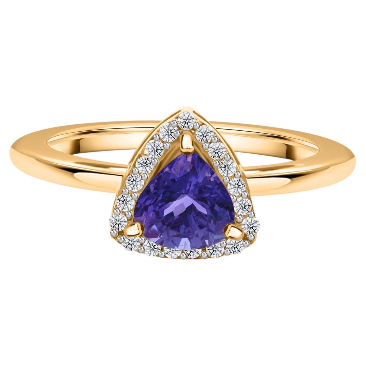0.65 Carat Tanzanite Gemstone 0.08 Carat SI/H Diamond Ring 14 Karat Yellow Gold